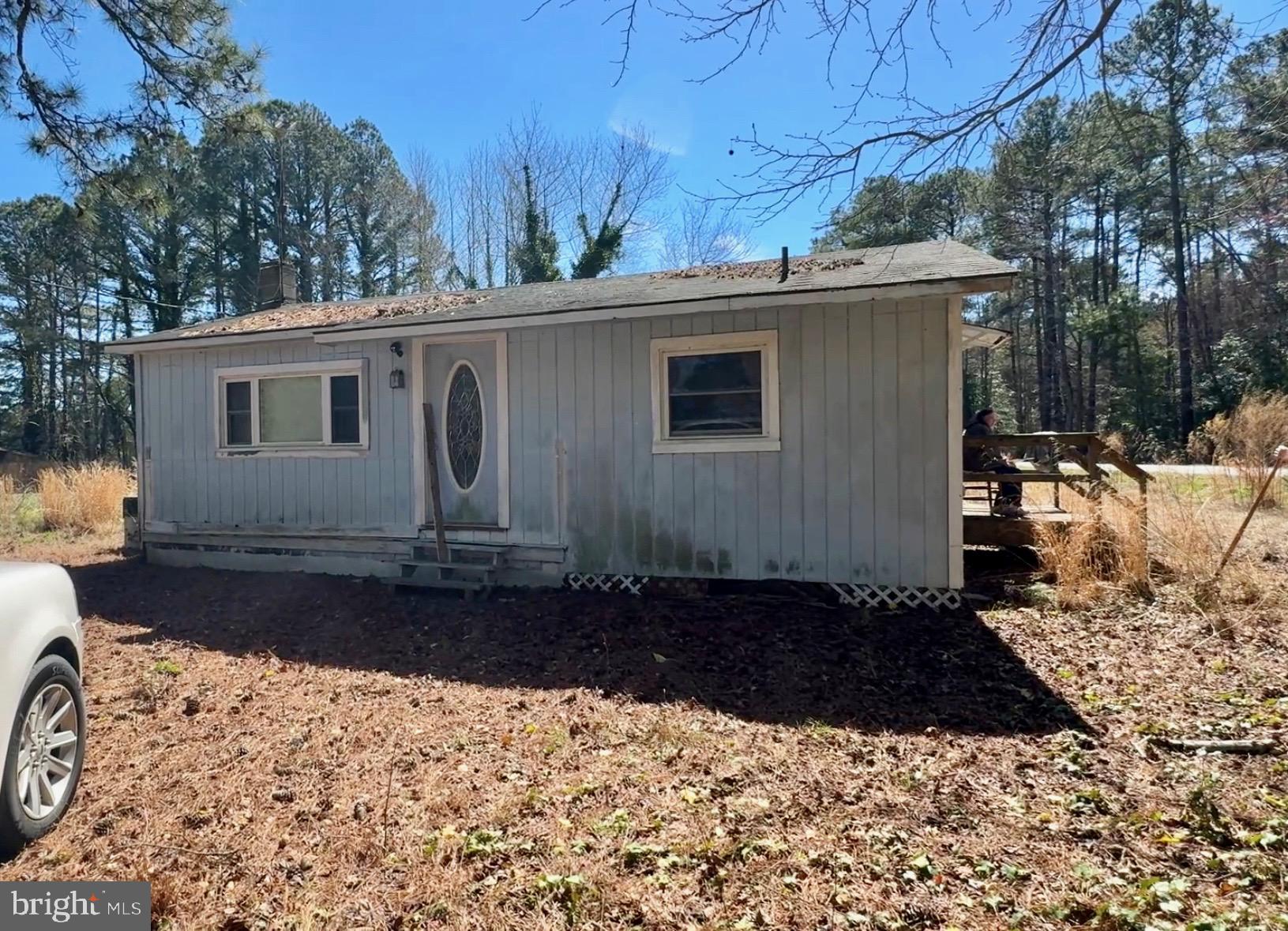 Discover the potential of this cozy 2-bedroom, 1-bath home nestled on nearly an acre of serene land. Featuring a functional kitchen and a comfortable living room, this property is being sold as-is, offering a unique opportunity for those looking to put their personal touch on their next home. The property includes an artesian well and a spacious shed, enhancing its value. Whether you're an investor or a DIY enthusiast, this home presents a fantastic chance to renovate and create your dream space. Don't miss out on this great investment opportunity!