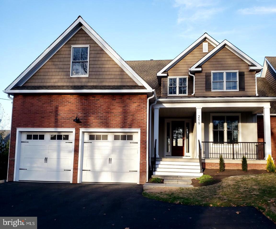 Tastefully contemporary and historically charming, The Calhoun Co., Inc Builders have created a new masterpiece.  Only one unit remains.  The unit features a first floor suite with large, dual walk in closets, custom tile shower, soaking tub, and sliding glass doors to a rear patio.  Additionally there is a two story cathedral ceiling living room with incredible double sliding glass doors and gas fireplace beautiful custom galley kitchen, gas cooking, with connected breakfast area which also features a sliding glass door to the rear patio.  The first floor also features the laundry room, dining room, foyer, mud room and powder room. The first floor has white oak hardwood floor throughout.  The second floor features a custom tile hall bathroom, 3 large bedrooms and very spacious bonus room.  Hallway finished with hardwood flooring while the bedrooms and bonus room are carpetted.  Completing the unit is a full basement with the potential for a package to be added on to finish the space with the sale.
