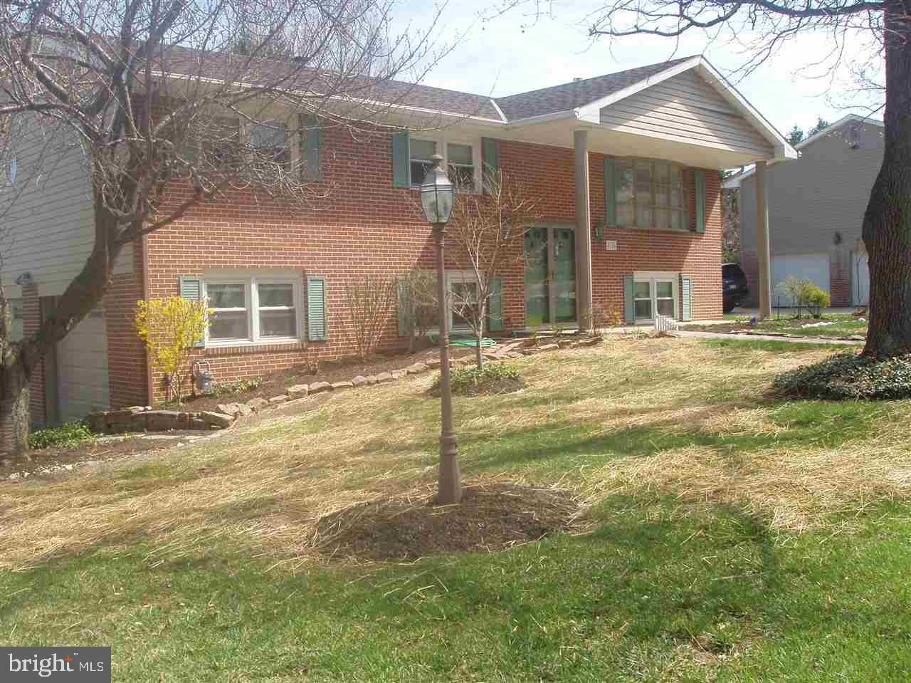 Lovely 3 bedroom, 2 bath split foyer on beautifully landscaped lot in Sherwood Forrest.  Freshly painted, cleaned, and move in ready.  Lower level family room with gas fireplace opens to lower patio and freshly painted deck above.