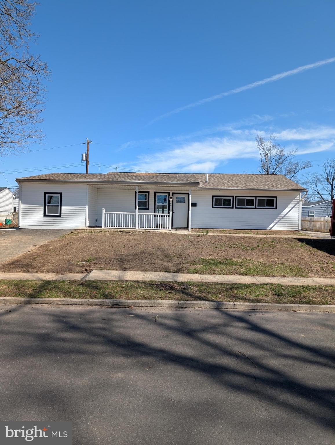 Beautiful expanded, completely remodeled Ranch showing 4 bedrooms, 2 1/2 baths, new sewer, electric and HVAC. Totally renovated, inside and outside.  Enter into a large open space Great Room featuring complete modern kitchen with Dishwasher, electric range, microwave, and large double door refrigerator. Four bedrooms, including a large main bedroom with full bath. Ceiling fans in all; new hall bath, powder room, and Laundry closet. Double doors lead you to a covered rear patio. All vinyl exterior. Large storage shed in rear of yard. Double driveway. Easy living.