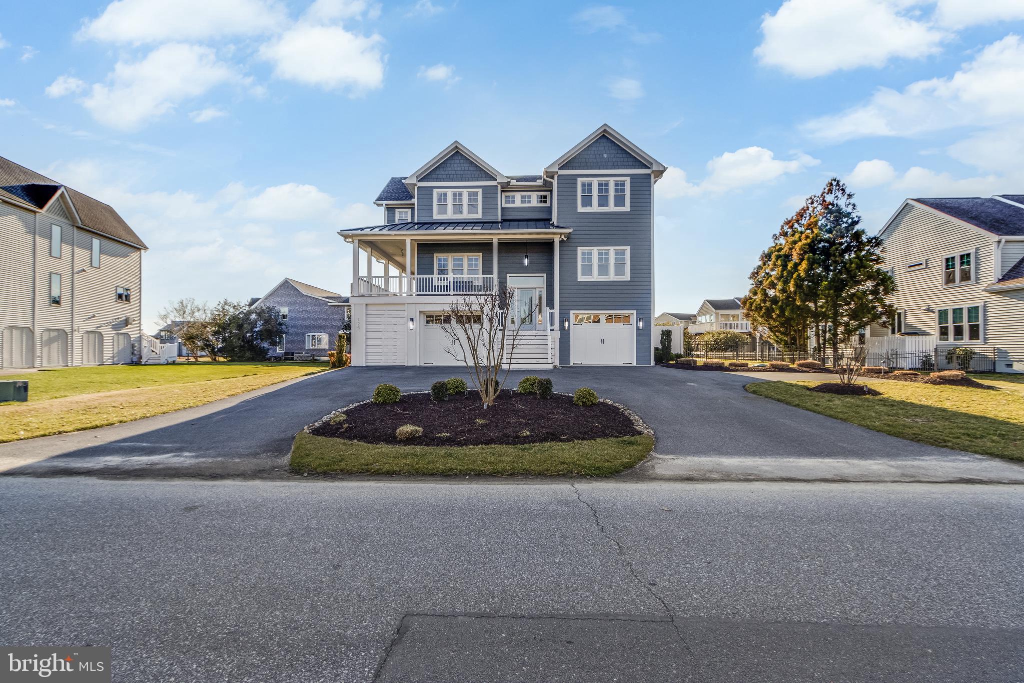Remarkable residence in Rehoboth Yacht and Country Club with expansive bay and golf course views. large rooms bathed in light and multiple indoor and outdoor entertaining areas.  This 4 Bedroom 4 Full and 2 Half Bath home is a must see and truly one of a kind.   No expense has been spared from the gourmet kitchen, to the custom furnishings and lighting throughout.  New 2023 addition included large indoor and outdoor entertaining spaces featuring two fireplaces, a wet bar/kitchenette, and an exercise area, all with direct access to the new inground pool and hot tub.