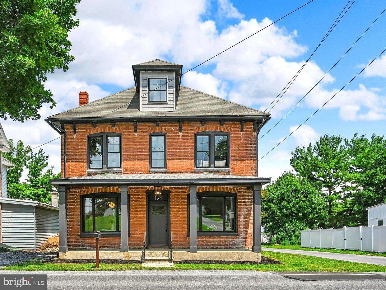 Welcome to this beautifully restored 20th Century 4-Square home, where timeless character meets modern luxury with nearly 2000 sqft of living space. Completely remodeled from floors to ceilings, this move-in-ready home offers 3 bedrooms, 3 full bathrooms, and a finished third-floor attic that could easily serve as a 4th bedroom, home office, or bonus space. Inside, you'll find soaring 9-foot ceilings and a stunning open dining and kitchen area featuring ceiling-height shaker cabinets, granite countertops, a large center island, gorgeous accent finishes, and wall to wall luxury vinyl plank flooring throughout with a mud room at the rear entrance. There is plenty of space for entertaining all your family and friends. The 2nd floor includes 3 spacious bedrooms with large closets, and laundry access. The primary suite includes a private en-suite bath, with private balcony access, the perfect place to enjoy your morning coffee or an evening book. Renovated from top to bottom including but not limited to a new natural gas furnace, central air unit, and water heater, all new windows, plumbing and electrical!  Offering peace of mind for years to come. Outside, enjoy a large backyard ready for your finishing touches and off-street parking for three vehicles. Located in the desirable ELCO School District, this exceptional home combines historic charm with modern finishes and is ready for its next owner. Schedule your private showing today! Showings start Friday 7/24/26. Open house Sunday 7/26/26 4-6 pm.