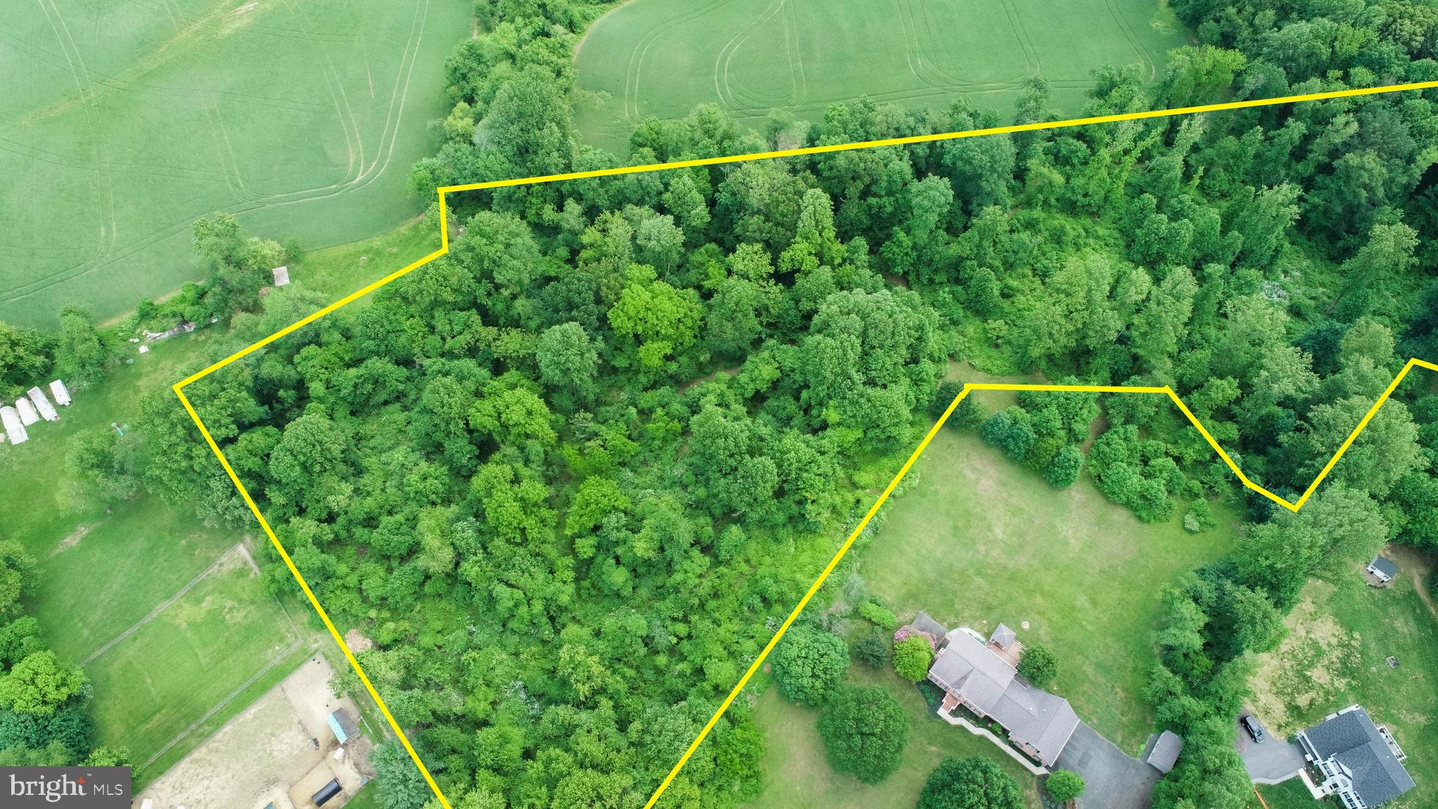 Build Your Dream Retreat in Scenic Forest Hill, Maryland. More photos to come!

Discover the perfect blend of privacy, natural beauty, and convenience on this exceptional 9.65-acre wooded lot in sought-after Forest Hill. Tucked away from the road and surrounded by mature hardwoods, this property offers the opportunity to build a custom home nestled over 1,000 feet from MD Route 543—providing both seclusion and sweeping pastoral views.

The land features gently rolling terrain, a natural spring, abundant wildlife, and maintained trails for hiking or peaceful strolls through your own private woodland. Bordering a preserved 129-acre farm and backing up to a tranquil wetland with views of a small creek, the setting offers unmatched serenity and a connection to nature. The lot has one development right and is accessed via a common driveway easement. A successful percolation test was completed and recertified in May 2024, streamlining the building process for your future home.

Located just 5–10 minutes from downtown Bel Air, Forest Hill offers the best of both worlds: rural charm and modern convenience. The nearby Ma & Pa Trail, local farms, and Harford County parks offer endless outdoor activities, while easy access to I-95 makes commuting to Baltimore or Philadelphia a breeze.

Don't miss this rare opportunity to create your own private sanctuary in one of Harford County’s most desirable locations. Buyers should confirm all plans and usage with Harford County Government.