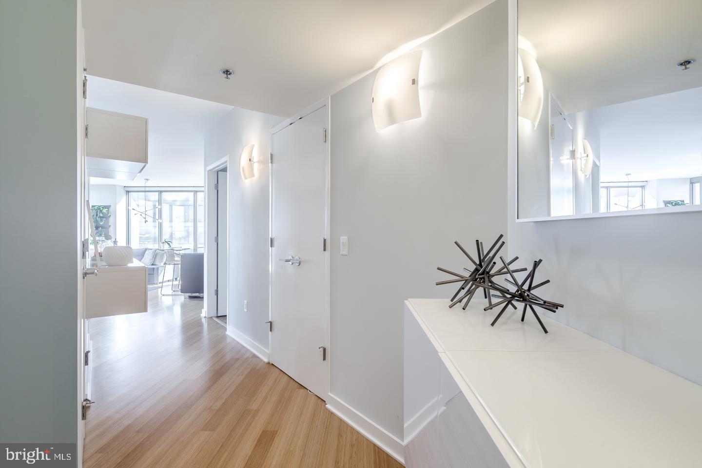 A spacious and luxurious condominium with amazing North and East facing views. This 2-bedroom, 2-bath residence features modern and luxurious finishes including granite countertops, wood floors, stainless steel appliances, 9-foot ceilings with floor to ceiling windows. The price includes a reserved parking space in the attached covered garage, and a storage locker. The building features a 24HR Concierge, fitness center, a heated 60FT lap pool, renovated sundeck/community room and much, much more! The building is situated conveniently next door to Trader Joes and Wine & Spirits - and is just walking distance from Philadelphia's top-rated restaurants. Spend the day shopping in Rittenhouse, or enjoying the sights at Boathouse Row, you can't beat the location and attractions located right near the Murano! Don't miss out on this unit! **UNIT PIC ARE OF ANOTHER SAME LAYOUT UNIT. ***