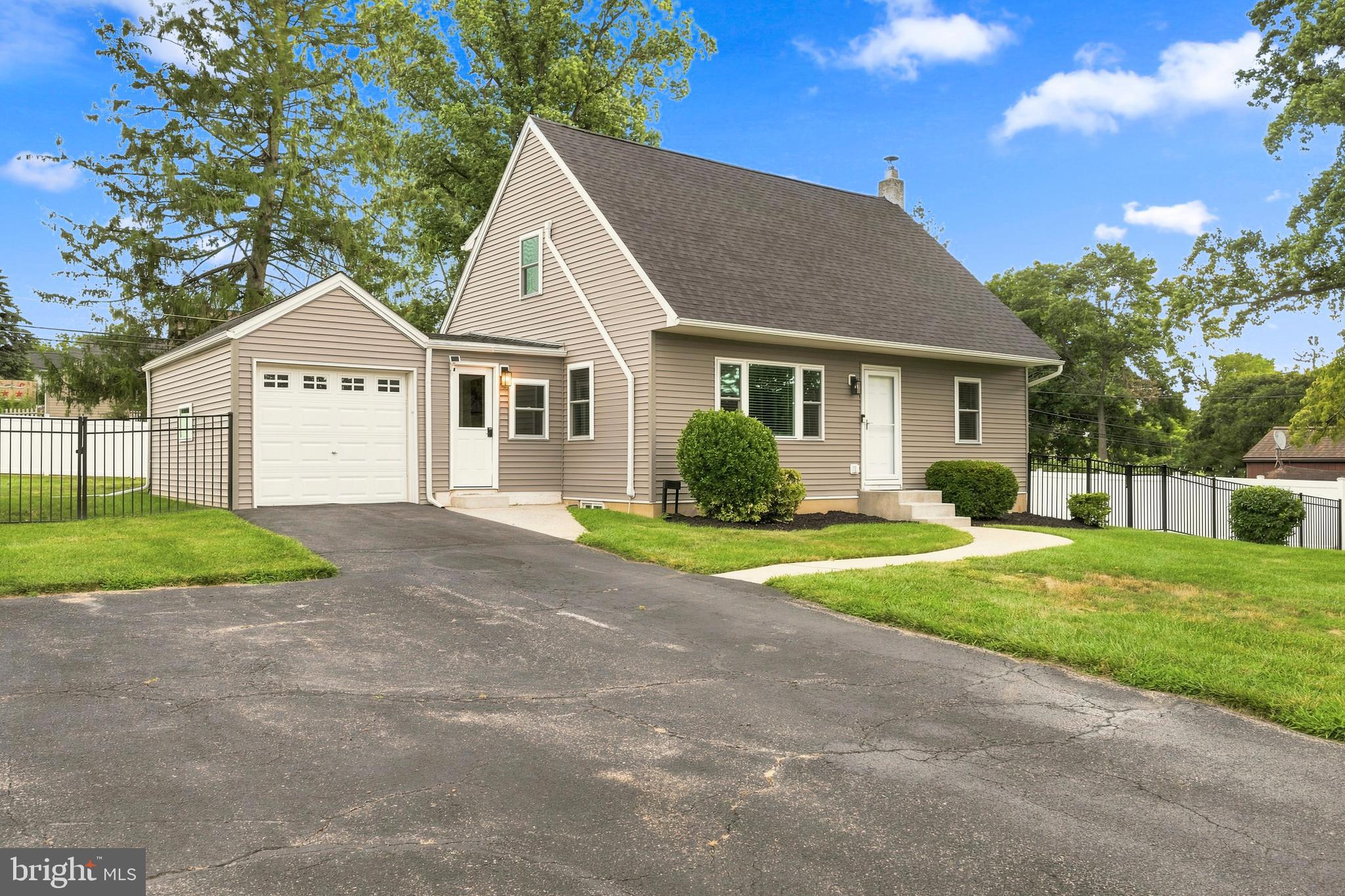 **207 Seal Lane | West Chester, PA**

Welcome to **207 Seal Lane**, a beautifully reimagined **3-bedroom, 2-full-bath** home offering **1,649 square feet** of thoughtfully designed living space in one of **West Goshen Township's** most established and desirable neighborhoods. Surrounded by mature trees, well-maintained homes, and neighbors who have invested in updating and enhancing their properties, this is the kind of community where pride of ownership is evident the moment you arrive.

Completely renovated in **2024**, this home offers the peace of mind that comes with virtually every major improvement already completed. Enjoy a **new roof, new siding, new windows, new Trex deck, new patio, new privacy fence, new shed, and a new HVAC system (2026)**—allowing you to simply move in and start enjoying your new home.

Inside, the home has been thoughtfully redesigned with today's lifestyle in mind. The stunning open-concept kitchen features custom cabinetry, modern appliances, generous prep space, and flows effortlessly into the living and dining areas—creating the perfect gathering place for everything from casual weeknight dinners to holiday entertaining.

Both full bathrooms have been beautifully updated with timeless, contemporary finishes. The finished lower level has been transformed into an incredibly versatile space with brand-new carpeting, a painted floor, and an industrial-style painted black ceiling. Whether you envision a family room, home theater, fitness area, playroom, game room, or additional work-from-home space, this flexible level easily adapts to your lifestyle.

The heated enclosed breezeway provides yet another bonus space that makes an ideal home office, art studio, craft room, reading lounge, or mudroom, while the attached one-car garage offers convenient parking and additional storage.

Step outside and discover an extension of your living space. The fully fenced backyard, expansive patio, and low-maintenance Trex deck create the perfect setting for summer barbecues, outdoor dining, children's play, relaxing evenings under the stars, or hosting unforgettable football watch parties in the fall. It's a backyard designed for making memories with family and friends.

Location is where this home truly shines. Situated within the highly acclaimed **West Chester Area School District**, students attend **West Chester East High School** and **J.R. Fugett Middle School**, both just minutes from the neighborhood. Everyday conveniences are equally close, with **West Goshen Shopping Center**, grocery stores, restaurants, healthcare, and fitness centers just around the corner. Outdoor enthusiasts will love being moments from **West Goshen Community Park**, offering walking trails, athletic fields, playgrounds, and year-round recreation.

Commuters will appreciate quick access to **Routes 202 and 3**, while those seeking the charm of Chester County will love being just a hop, skip, and jump from the vibrant **West Chester Borough**, where award-winning restaurants, boutique shopping, local breweries, coffee shops, seasonal festivals, and a lively arts scene create an unmatched lifestyle.

This is the perfect home for buyers who appreciate a beautifully renovated property in an established neighborhood with mature landscaping, timeless character, and a true sense of community. Here, weekends are spent enjoying everything West Chester has to offer—not tackling home improvement projects.

**Every major renovation has already been completed. All that's left to do is move in, unpack, and start living the West Chester lifestyle you've been waiting for.**