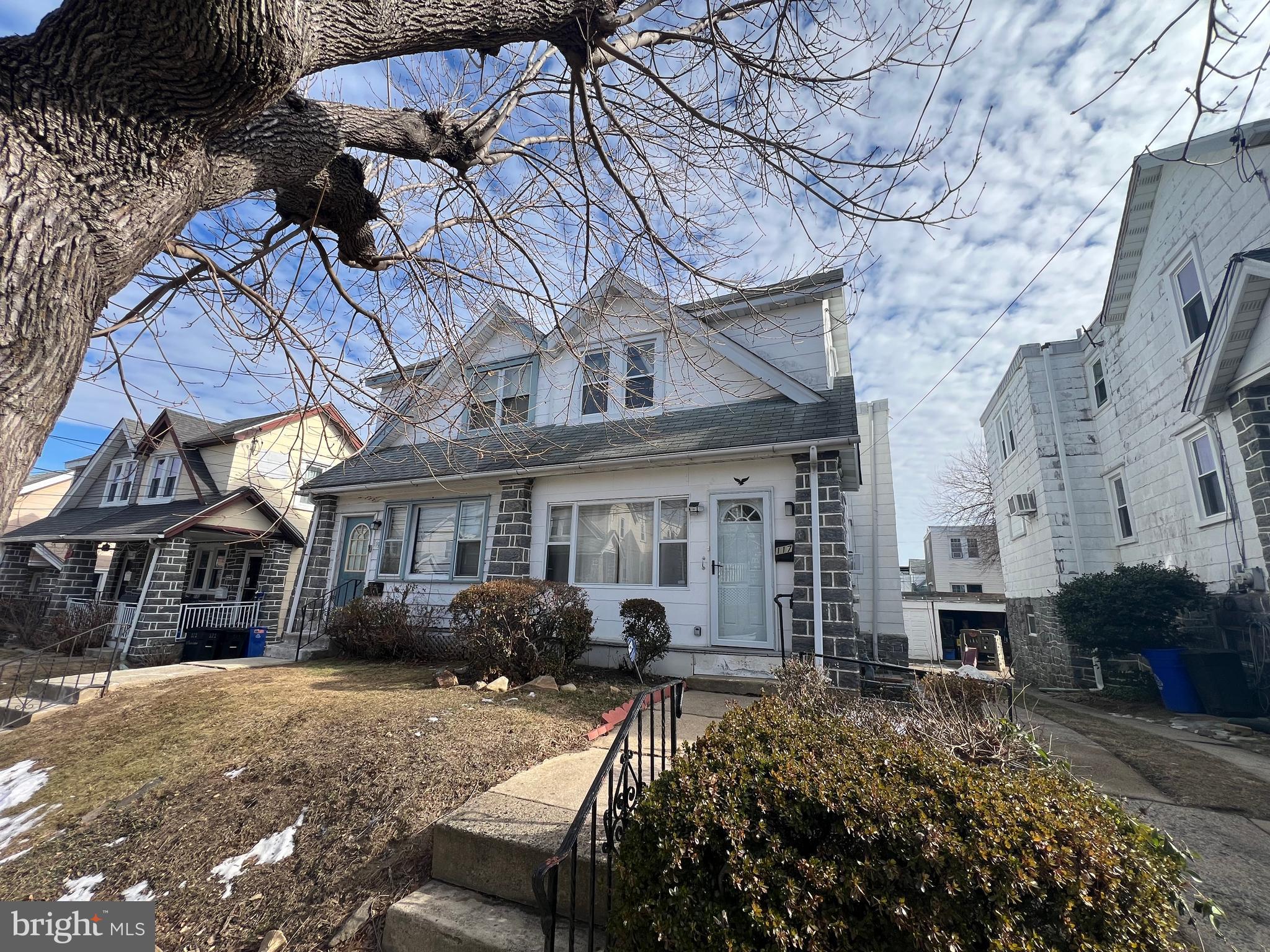 This stunning twin home is located on a quiet, residential street in Upper Darby. Located just off of West Chester Pike, you will love the easy access to plenty of great shops, restaurants and entertainment in the area. This stunning home is available NOW and ready for immediate move-in!

Enter the home and immediately fall in love with the sunroom. This space is perfect for storing coats, boots, and other household items. Once inside the living room, you will be greeted with original hardwood flooring and a decorative stone fireplace. There is an unobstructed sight line into the kitchen which is perfect for when you're entertaining guests!

The kitchen has been renovated and looks absolutely luxurious. It has been upgraded with stone tile flooring, shaker-style cabinetry, stainless steel appliances, and a custom tile backsplash! There is plenty of storage space throughout the oversized cabinets and enough counterspace to prepare any meal you can imagine!

The hardwood flooring flows continuously into three of the four bedrooms. Each bedroom also includes ample closet space, a ceiling fan, and large windows which allow tons of natural light to pour in.

There are two full bathrooms in the home which ensures there is plenty of privacy for everyone. The primary bathroom has been renovated with stone tile flooring, modern vanity, and a full-sized bathtub/shower with a custom tile surround. This bathroom truly feels like having a spa inside your own home!

In addition to all of the other great features throughout the home, there is also a fully finished basement with a bonus room! The basement is carpeted and is perfect for an additional living space, playroom, or home office. The basement also includes a laundry room with full-sized washer and dryer!

The back of the home has a spacious balcony which overlooks the large backyard. This home also includes a one-car garage for added convenience! *Driveway is shared with neighbor and cannot be used for additional parking*.

Tenants are responsible for electric, gas, water, trash, and cable/internet in addition to rent each month. Sorry, no pets permitted.

Application Qualifications: Minimum monthly income is 3 times the tenant’s portion of the monthly rent, acceptable rental history, acceptable credit history and acceptable criminal history. More specific information provided with the application.