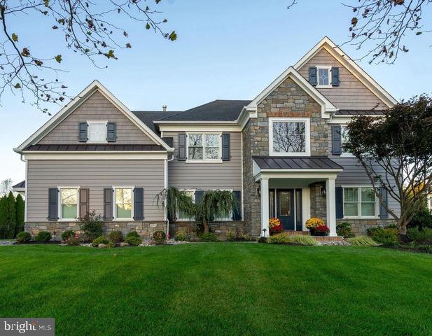 Welcome to 33 Bittersweet Drive, a beautifully crafted home in desirable Doylestown, located within the Blue-Ribbon Central Bucks School District. This one is truly the crown jewel of the Doylestown Lea. Situated on over half an acre of professionally landscaped grounds, this stunning 5-bedroom, 2.1-bath residence has been meticulously and comprehensively renovated, offering the perfect blend of luxury, comfort, and turnkey convenience. Every detail has been thoughtfully upgraded — there is truly nothing left to do but move in.  Inside, the home showcases rich hardwood flooring and custom millwork throughout both the first and second floors, creating a seamless and elegant flow. The entire interior recently painted feels fresh and refined throughout. The chef inspired kitchen features high-end custom cabinetry, quartzite countertops, tiled backsplash, a farmhouse sink, a pot-filler faucet, and professional grade appliances from Sub-Zero, Wolf, and Miele, creating a timeless design. The seamless flow carries you to the large sun-lit breakfast room and adjacent family room with a full stone fireplace and custom wine bar for the perfect entertaining spot. A dining room with custom wainscoting will surely be the place to gather. The thoughtfully designed mudroom addition with portico entry off the driveway enhances both functionality and curb appeal. Upstairs, the primary bedroom suite is a retreat, featuring vaulted ceilings, natural light, and a relaxing sitting area. The master bathroom is spa-inspired with dual vanities, soaking tub, glass-enclosed tiled shower and heated tile floor. Additional four (4) bedrooms are generously sized and have ample closet space. The finished basement includes a bar area, shuffleboard table, fitness room, and open TV seating area for entertainment and relaxing. Major exterior improvements elevated the home’s presence with a striking front stone façade, front porch, premium siding, architectural roof, carriage style insulated garage doors, all new windows and exterior doors, providing both beauty and energy efficiency. A whole-house generator adds peace of mind. Designed for exceptional indoor-outdoor living, the backyard was fully transformed into a true private resort. A fully covered porch with custom millwork, natural gas fireplace and full cooking area, including high-end appliances will truly create the ultimate entertainment haven. Step off the porch to a beautiful paver patio with a full wood burning fireplace and sitting walls. Enjoy a recently renovated, heated, in-ground pool and spa with new equipment along with expansive outdoor living spaces perfect for entertaining and relaxing. Additional upgrades include a two-car garage with cabinetry for plenty of storage and a finished epoxy floor. Full Irrigation System with Bi-Pass Water Meter will keep the lawn and garden looking green all summer. Public water, public sewer, and natural gas add further everyday convenience.  Located just steps from Doylestown Central Park—home to the award-winning Kids’ Castle and the newly opened Township Community Center with brand-new tennis, pickleball, and basketball courts—this property offers exceptional access to recreation. Additionally, vibrant Doylestown Borough is just minutes away, where you can enjoy an array of shops, dining, and cultural attractions. 

This home offers not just a place to live — but a lifestyle to love.  
33 Bittersweet is truly the best of Doylestown Lea. 
Luxury, location, and flawless condition - this is the one you’ve been waiting for.