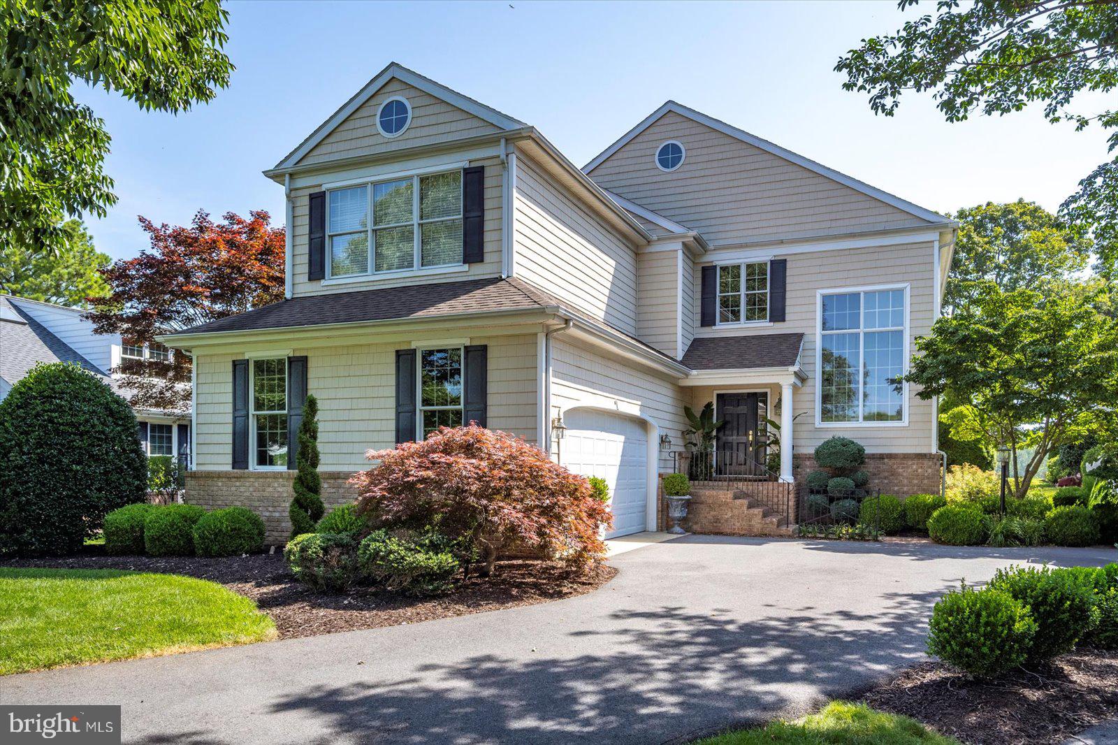NEW PRICE JUST IN TIME FOR SUMMER ENJOYMENT! Nestled in the gated riverfront community of Cherry Hill and minutes from Tidal Health, Salisbury University, and Downtown Salisbury, this stately 3991 SF, 4 bedroom, 3.5 bath residence offers an inviting floor plan with an emphasis on relaxed living and entertaining. Tranquil water views enhance the spacious home featuring hardwood flooring in all 1st floor rooms. an open staircase, hardwood 2nd floor hallway, relaxing primary suite  w/ gas fireplace, tray ceiling, and hardwood floors, as well as 3 additional bedrooms and a bonus room with new neutral carpet. The hub of the home is the gourmet kitchen offering a 6-burner gas range, walk-in pantry, large work island, separate breakfast bar, casual dining area, and is open to the window-filled great room w/ gas fireplace and patio access. Other 1st floor gathering spots include the formal dining room and flex space w/ built-in bar and patio access. Enjoy viewing the creek, river and wildlife from the back yard and inviting patios. Take a stroll to the community waterfront area w/ picnic table, casual seating, and bulkhead for temporary boat tie up. Quarterly condo fee includes lawn care, in ground irrigation, septic, trash pick-up, entrance gate maintenance, road maintenance, and snow removal. UPDATES INCLUDE: 1ST AND 2ND FLOOR HEAT PUMPS (8/2024), GENERAC WHOLE HOUSE GENERATOR (2023).