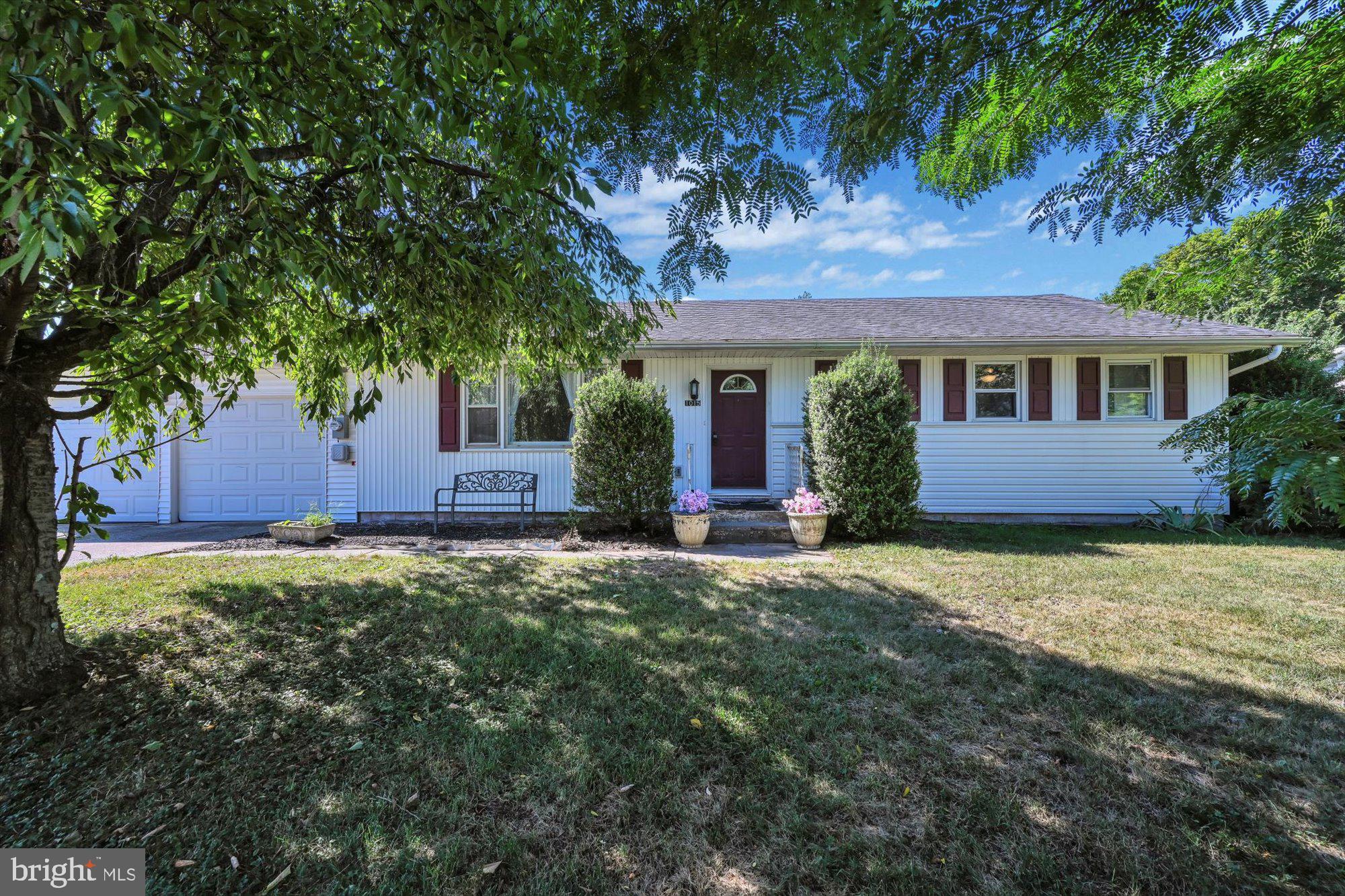 Enjoy one floor living in this charming Hegins Valley Rancher! The home features a 2-car attached garage with 3 Bedrooms, 1 Full Bath, and 1 Half Bath.  Large Living Room, Eat-In Kitchen (appliances included), and Sun Room/ Laundry on rear of home.  A B-Dry waterproofing system complements the full Basement as well as a newer 200amp electric service and a supplemental wood pellet stove for those chilly winters.  Full Bathroom had a complete remodel in 2017.  Oil heat, almost all windows are vinyl replacement, and hardwood flooring throughout most of home.  Enjoy privacy with mature landscaping at front of home.  Perfect-sized backyard and deck for entertaining, playing ball with the kids, or simply relaxing.  With some paint and finishing touches, this home can easily become your vision! Close proximity to ball fields, Hegins Park, and community pool! Showings start 8/13- Schedule yours today!