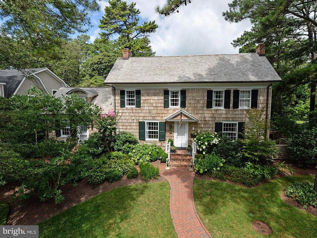 The finest historic architecture perfectly combined with all of today?s modern luxuries in The Pines. Considered one of the most magnificent properties in Rehoboth Beach, this home exudes the original character & charm dating back to the early 1800 & 1900?s. Recent improvements include a complete restoration in 2004-2006 with many enhancements over the last decade. The sprawling first floor includes multiple spaces with a cozy living room & wood-burning fireplace greeting you at the entrance. The custom gourmet kitchen opens to a sun-filled family room with beautiful reclaimed pine beams & paneling. The second floor includes three charming guest bedrooms & master bedroom with a luxurious master bath. The exterior features lush landscaping with beautiful privacy hedges, heated swimming pool, brick courtyard, outside shower, & guest cottage. The finer details include antique/reclaimed hardwood floors, all Waterworks tile & fixture baths, radiant heat floors, custom built-ins & much more.