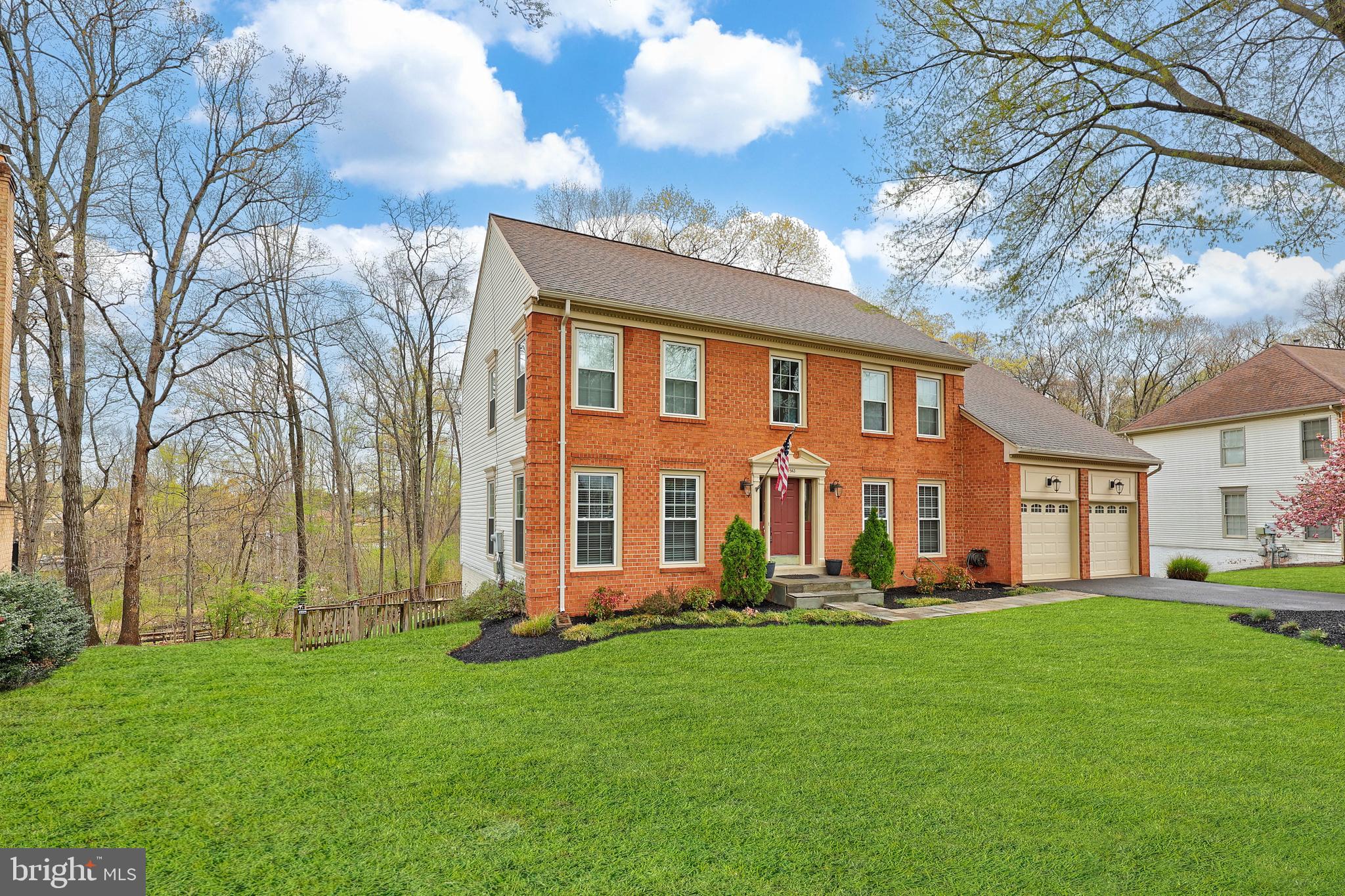 Welcome to the highly sought-after Waverly Crossing neighborhood, where this exceptional 5-bedroom, 4-bathroom colonial home awaits. Offering three levels of expansive living space, a two-car garage, and a serene, private backyard, this home is the perfect blend of comfort and convenience. The main level boasts beautiful LVP and hardwood floors throughout, with an open-concept kitchen featuring generous cabinet and counter space—ideal for preparing meals and hosting gatherings. The kitchen seamlessly flows into the dining room, perfect for entertaining, while the family room provides a cozy retreat to unwind. A private study offers a quiet space for work or reading. A spacious secondary living room, enhanced by a charming brick wood burning fireplace that provides yet another area to relax. A convenient half bath completes this level. Upstairs, you'll find elegant hardwood floors throughout. The expansive primary bedroom is a luxurious retreat, featuring dual closets, an extended sitting area, and a spa-inspired remodeled en-suite bath with dual vanities, a soaking tub, and a separate shower. The upper level also includes three additional generously sized bedrooms and a full bath, offering ample space for family or guests. The fully finished lower level expands your living space with a large recreation room, an additional spacious bedroom, a full bath, and a kitchenette with plentiful storage. From the lower level, step outside into the tranquil backyard, surrounded by mature trees and a multi-level deck—perfect for enjoying the outdoors. The home overlooks a natural conservation area, offering picturesque woodland views. The spacious, fenced yard features three gated entries for easy access. Updates include a new roof (2014), HVAC (2024), hot water heater (2020), windows (2020), new LVP floors in the kitchen and basement (2025), a new composite deck (2023), new basement walk-out French doors (2025), a new fireplace liner (2022), and a new flagstone front porch and walkway. Additional updates include all-new LED lighting, four new toilets, and updated fixtures throughout. Situated in the vibrant Waverly Crossing community, this home offers a wealth of outdoor amenities, including tennis courts, tot lots, pickleball courts, and scenic jogging/walking paths—perfect for active lifestyles. Nature lovers will appreciate the proximity to Flatlick Stream Valley Park and Elleanor C. Lawrence Park for even more recreational opportunities. Commuting is a breeze with easy access to the Dulles Toll Road, Route 28, Route 29, Route 50, the I-66 corridor, and the Fairfax County Parkway. This home is just minutes from Wegmans, Aldi, Costco, Target, Walmart, Fair Lakes Shopping Center, Fair Oaks Mall, Sully Community Center, Cub Run Stream Valley Park, Frying Pan Park, Dulles Expo Center, the Udvar-Hazy Center, and Dulles Airport. Enjoy convenient access to popular dining and shopping in Chantilly and the surrounding Fairfax County area.