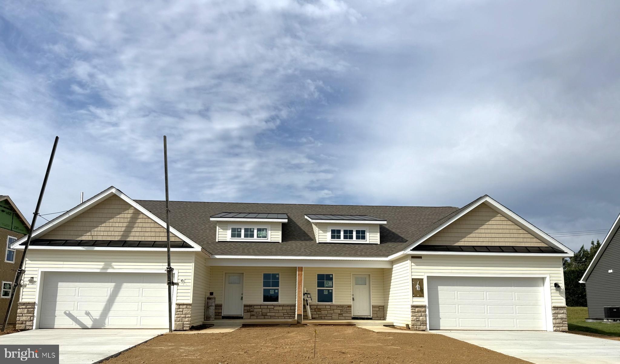 Welcome to The Communities of Burwell!  This beautifully designed 2-bedroom, 2-bath villa offers 1,527 square feet of single-level living with the elevated finishes you’ve come to expect from Four Points Construction. Inside, you’ll find luxury vinyl plank flooring, granite countertops, stainless steel appliances, and carefully selected fixtures that blend modern style with everyday comfort.  The open-concept layout provides spacious living and dining areas, perfect for both relaxing and entertaining, and extends seamlessly to a screened-in porch—an ideal spot to enjoy your morning coffee or unwind in the evenings while taking in the peaceful surroundings. Thoughtful design details and energy-efficient construction make this home perfect for those looking to downsize without compromise or enjoy low-maintenance living in a brand-new home.  Conveniently located near I-81, Hedgesville, and Spring Mills—with shopping, dining, and everyday essentials just minutes away—The Communities of Burwell offers the perfect balance of comfort, style, and convenience.  60 day delivery!  Stop in our model home on Barrier Reef to to take a tour