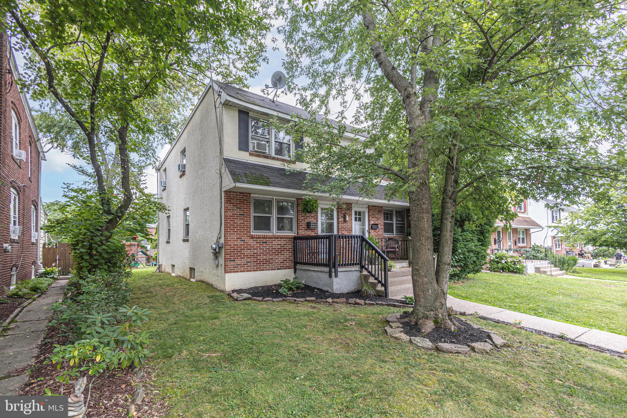 Walk to everything you love about Doylestown Borough from this beautifully updated three-bedroom, one-and-a-half-bath twin with parking tucked away on a quiet, tree-lined street just two blocks from the heart of town. Offering the perfect balance of charm, thoughtful updates, and everyday convenience, this home invites you to enjoy one of Bucks County’s most sought-after lifestyles.
Inside, you’ll find warm, inviting living spaces highlighted by hardwood floors throughout the first floor and an expanded eat-in kitchen that was thoughtfully reimagined to maximize both function and flow. Featuring granite countertops, a stone tile backsplash, stainless steel appliances, newer dishwasher and microwave, generous prep space, and a cozy corner perfect for morning coffee or catching up on emails, this kitchen is truly the heart of the home. Original hardwood floors in 2 of the 3 bedrooms upstairs and lie beneath the carpeting of the 3rd bedroom. 
The finished lower level provides exceptional bonus living space—ideal as a playroom, media room, home gym, or the ultimate game-day retreat for entertaining family and friends.
Step outside to what may become your favorite “room” of the house. The beautiful stone patio is surrounded by mature landscaping and vibrant perennial gardens, creating a peaceful backyard retreat that feels like your own private oasis. Whether you’re enjoying coffee while listening to the birds, hosting summer dinners, or simply unwinding after a busy day, this outdoor space is truly something special.
Additional highlights include replacement windows throughout, newer stainless steel kitchen appliances (approximately five years old), a newer washer and dryer (approximately two and a half years old), private off-street parking for three vehicles, and the charm of rear alley access that enhances both convenience and privacy.
Just steps from award-winning restaurants, boutique shopping, parks, museums, coffee shops, and year-round community events, this home offers more than a beautiful place to live—it offers the walkable Doylestown Borough lifestyle buyers dream about.