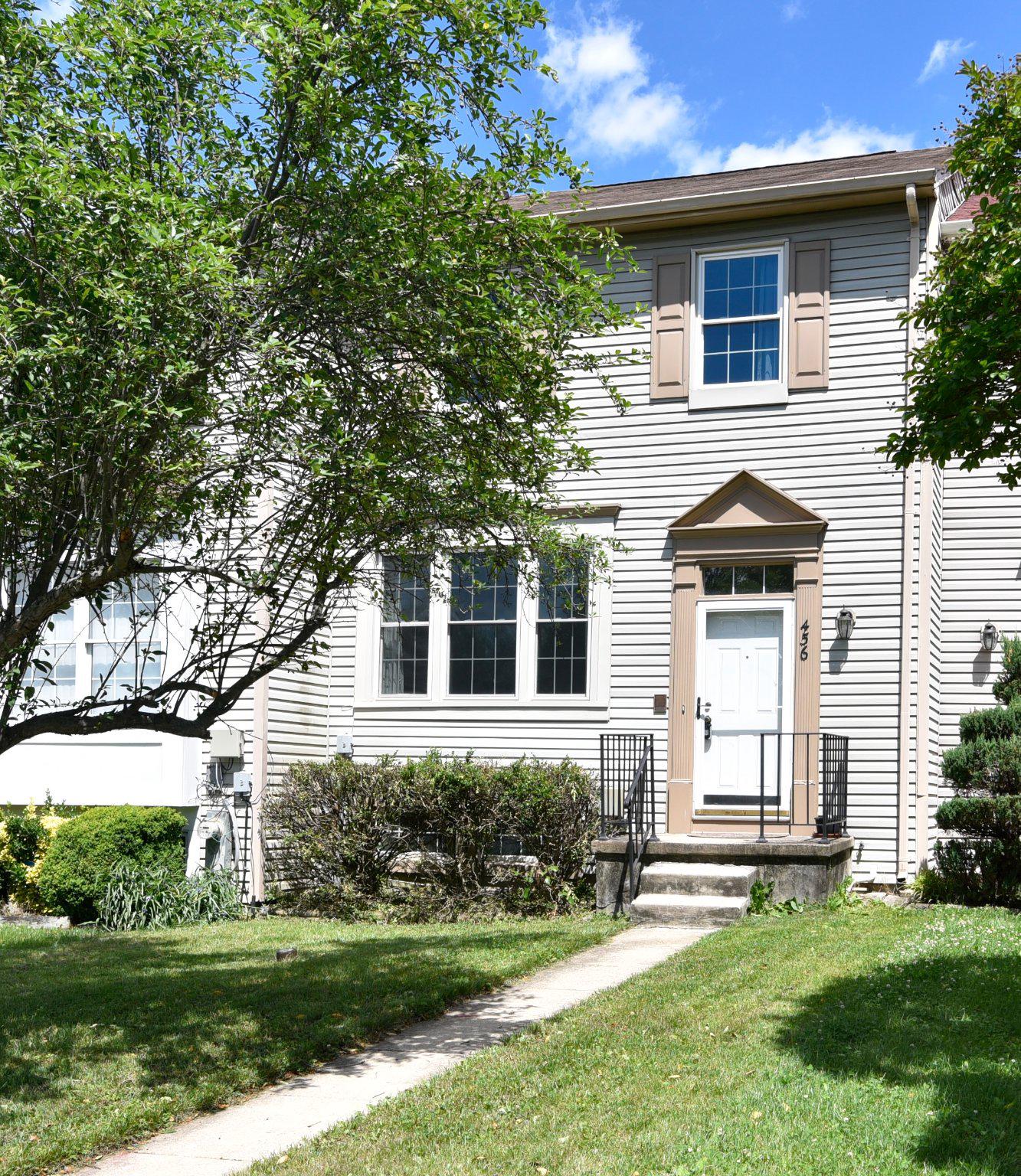 This approximately 1,800 square foot townhome offers three bedrooms and three bathrooms. The open floor plan features a spacious living area with abundant natural light. The kitchen is equipped with modern appliances (brand new stove and refrigerator) and ample counter space, providing a functional cooking environment. The primary bedroom boasts a en-suite bathroom, while the additional two bedrooms share a full bathroom. The property includes a large deck immediately off of the kitchen/dining area with lovely views of trees and Barlowe Field & Park offering the potential for relaxation or entertainment. This residence could be suitable for a variety of lifestyles and living arrangements.