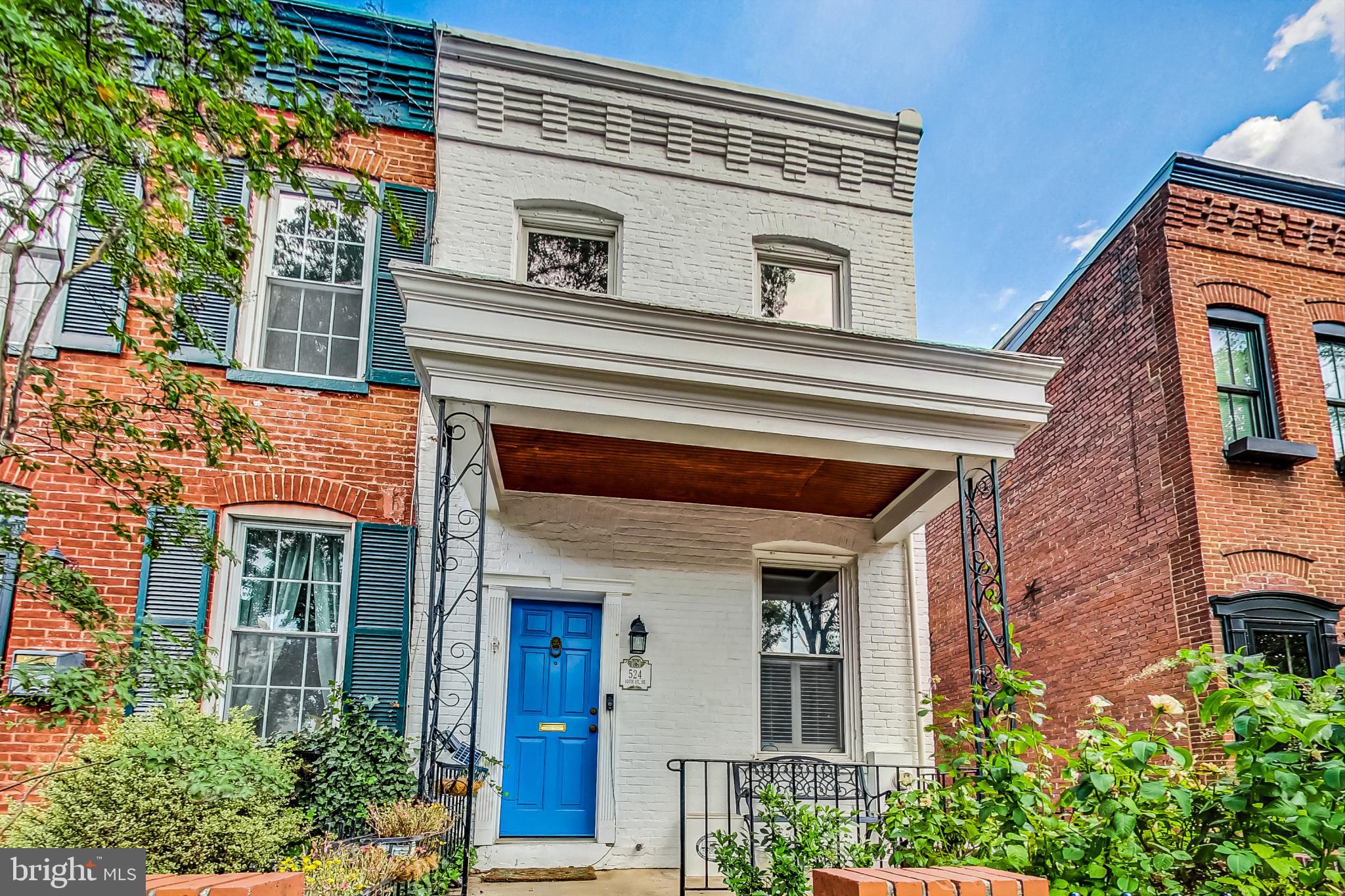 This elegant end unit row home exudes spaciousness and natural light, providing an inviting and functional living space. It boasts a thoughtfully designed layout that includes a main floor den / bedroom with an ensuite bath, making it a versatile space for guests, an office, a playroom, or a cozy TV room. The upper level features two generously sized bedrooms and a sprawling hall bath with a large vanity. The convenience continues with secured parking that comes equipped with roll up gate and an electric car charging station.
Located steps from the shops and restaurants of barracks row and just a brief 5-minute stroll from Eastern Market, this home allows you to relish the pleasures of city living in a fully renovated abode. Premium finishes and modern upgrades abound, creating an environment that effortlessly blends style and functionality.  Schedule a viewing today to experience the luxurious comfort and convenience it offers firsthand!