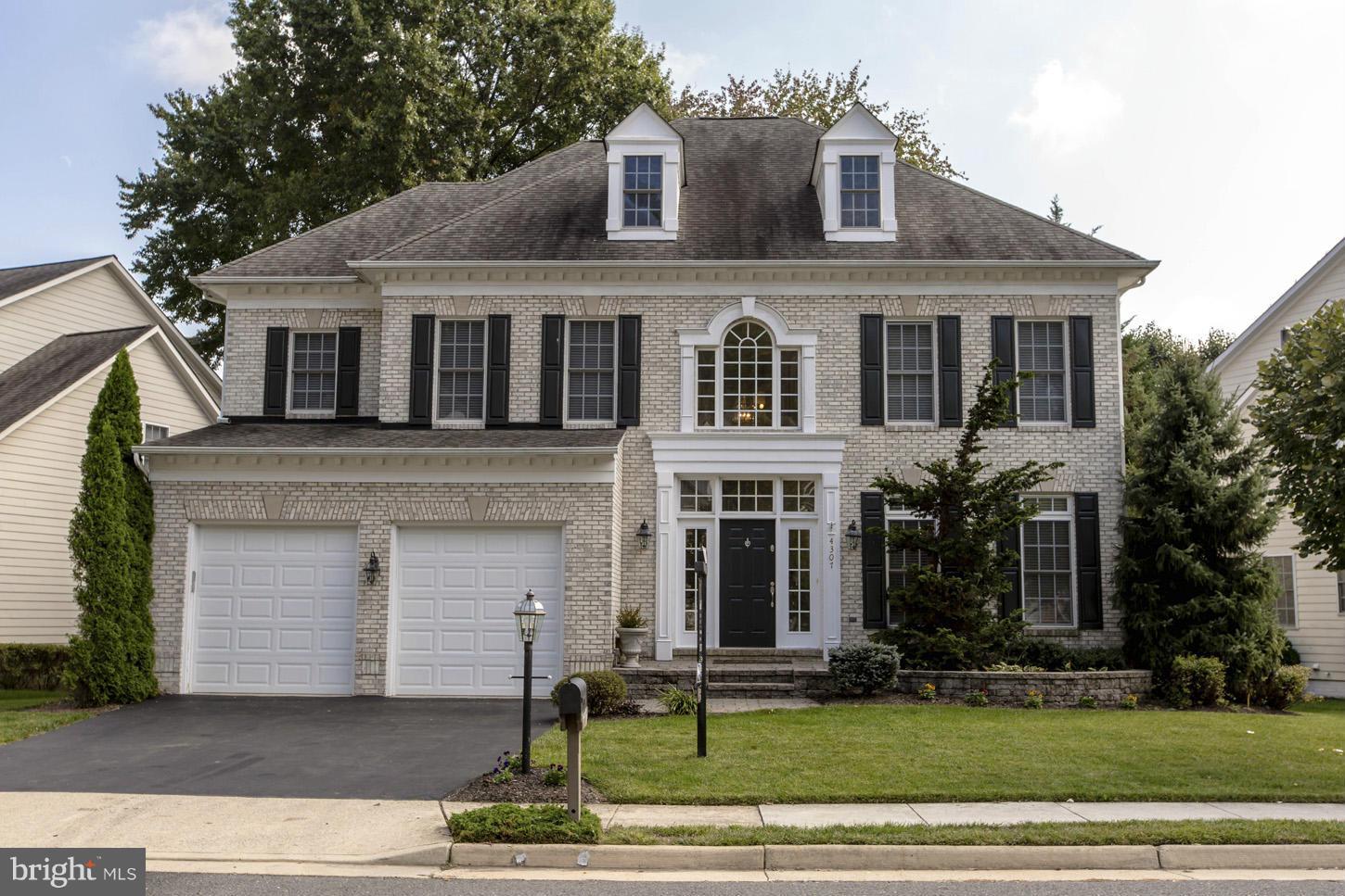 4 Bed/4.5 Bath Brick Front Colonial in highly sought after community. Open & Bright home with high ceilings. Upg Chef's kit w/Cherry Cabs/exotic granite/SS appl/tile w/ WI Pantry. Study on main lvl. Hdwd in LR/DR/Foyer/Mud Rm/ Upper Hall & Step Up MBR/Sitting Rm. Laundry on Bed lvl.  Fully fin bsmt incl Rec Room, Exercise Rm, Den/BR & full bath. Deck w/stairs to patio in the rear. A MUST SEE!