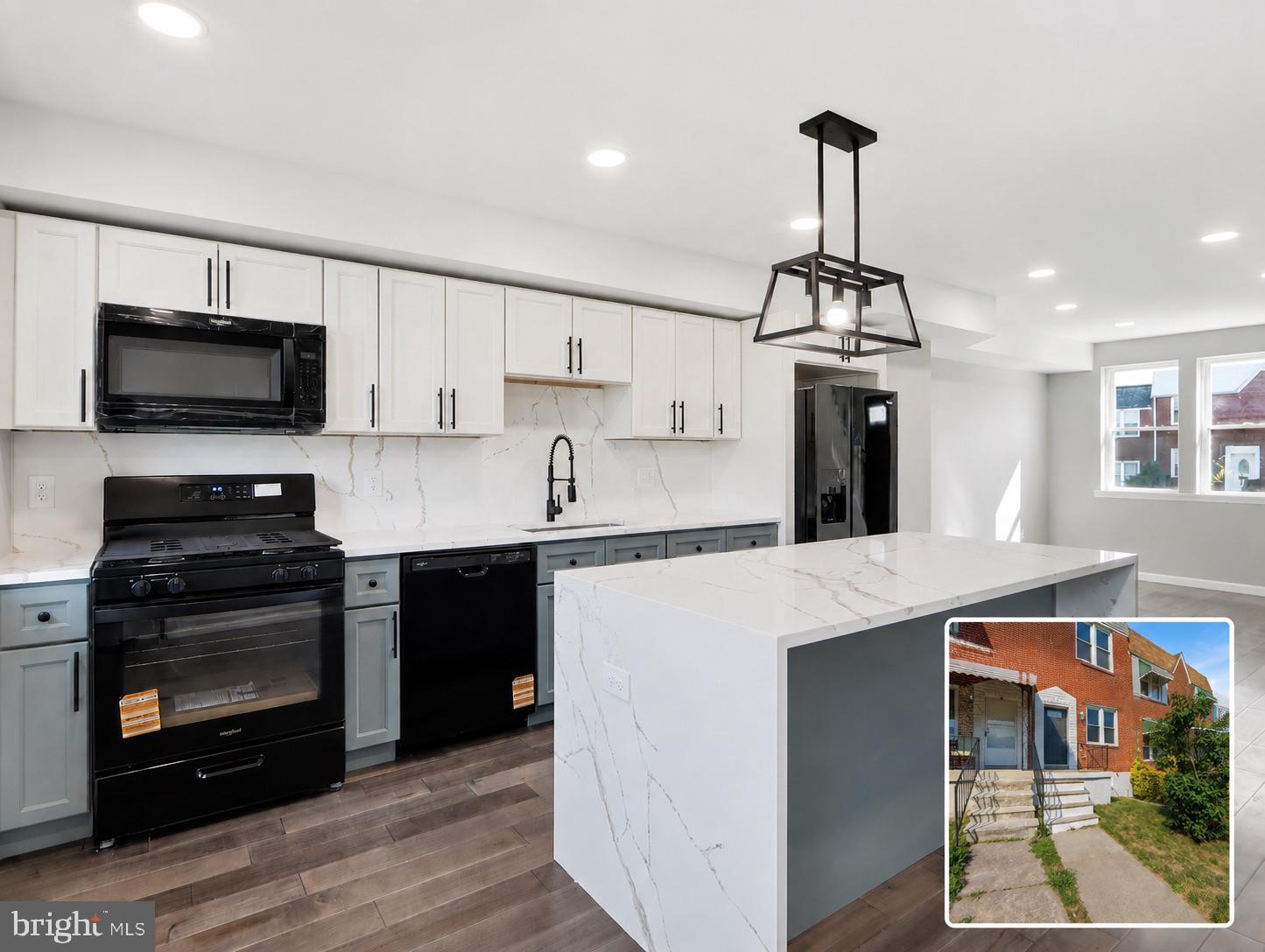 For sale and ready for a new owner! Fully renovated and move-in ready, this 2-bedroom, 2 full bath townhome has been updated from top to bottom with modern finishes throughout! Hardwood flooring runs through the main level and leads into a stunning kitchen with two-tone cabinetry, quartz countertops, with matching backsplash, and sleek black appliances. The oversized island features a quartz waterfall edge, ample seating, and a built-in wine cooler perfect for entertaining. Upstairs, you will find two spacious bedrooms with new carpet, fresh paint, and tons of natural light. Both full bathrooms have been completely renovated with custom ceramic tile, new vanities, and modern fixtures. The finished lower level provides additional living space that works perfectly as a family room, rec room, or home office. Major updates include new vinyl windows, central HVAC, and a new water heater. Parking is easy with plenty of street parking and additional spaces located at the end of the street. This home sits on the last block of a quiet one-way street and backs directly to a baseball field, park, and playground. The renovated Morrell Park Community Center is within walking distance. Conveniently located just minutes from downtown Baltimore, the stadiums, shopping, dining, and major commuter routes. Schedule your showing today!