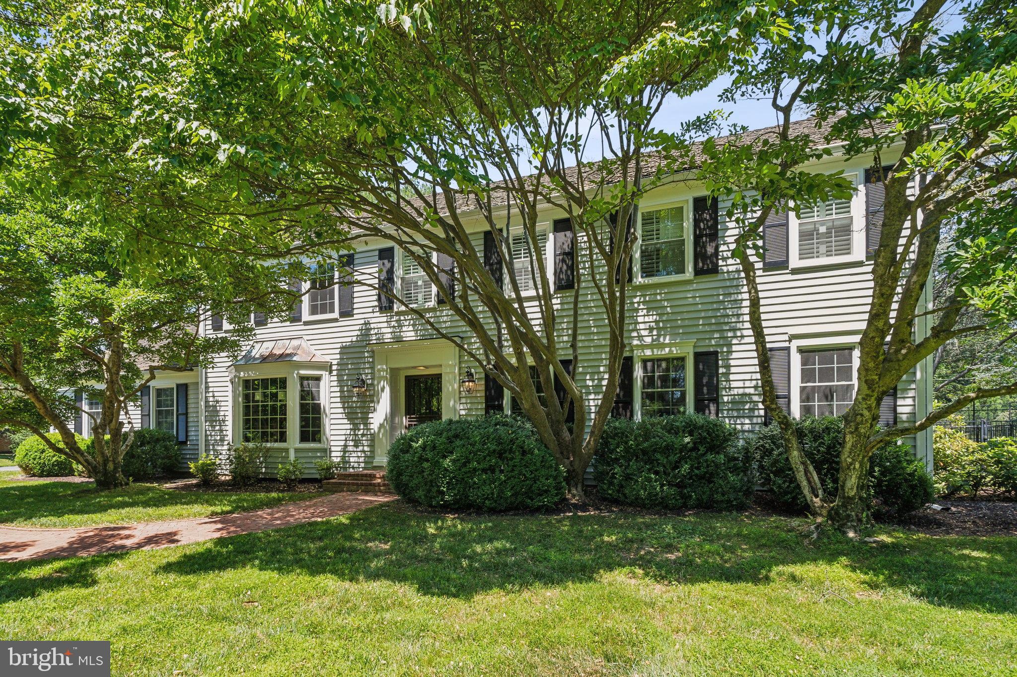 Tucked behind a wall of tall pine trees, offering complete year-round privacy, down a long driveway past a sweeping front lawn, lies this quintessential Potomac Falls colonial.  The current Owners set out to reconfigure, renovate and update until every detail was perfected.  From the gleaming hardwood floors to the custom built-ins, the completely redesigned Chef's Kitchen to the backyard oasis, no expense was spared.  

This classic, center hall floor plan offers everything you would expect, with surprises beyond your imagination.  Step through the front door into the welcoming Foyer, where the entire main level is within reach.  To the right is the generously proportioned Formal Living Room with a full wall of custom built-in bookcases. The Formal Dining Room offers a large picture window and, for the passionate oenophile,  an adjacent wine cellar with three, state-of-the-art wine coolers. Wine at your fingertips!  The Chef's Kitchen is magnificent  with sumptuous Taj Mahal quartz countertops, cabinets with European style gold mesh detailing, designer lighting and top-of-the line professional grade appliances.  Adjacent to the Gourmet Kitchen is the comfortable Family Room with a wood burning fireplace, built-in bookcases and a wine bar.  Completing the main level is the Kitchen Eating Area, the Mudroom with built-in custom lockers and a gorgeous Laundry Room with a farm sink. Wait till you see the Upper and Lower Levels - perfection on all floors!  All this plus a location in Potomac's most coveted community, Potomac Falls, and within easy access to Potomac Village and Great Falls National Park, Billy Goat Trail, the Gold Mine Trail and the C&O Canal.  Churchill schools, too!  Easy access to the Clara Barton Parkway and I-495, local area airports, Tyson's Corner, Westfield Montgomery Mall, the I-270, BioMed Corridor! Churchill school cluster.  Don't miss this special offering!  It's a dream!  Act now!