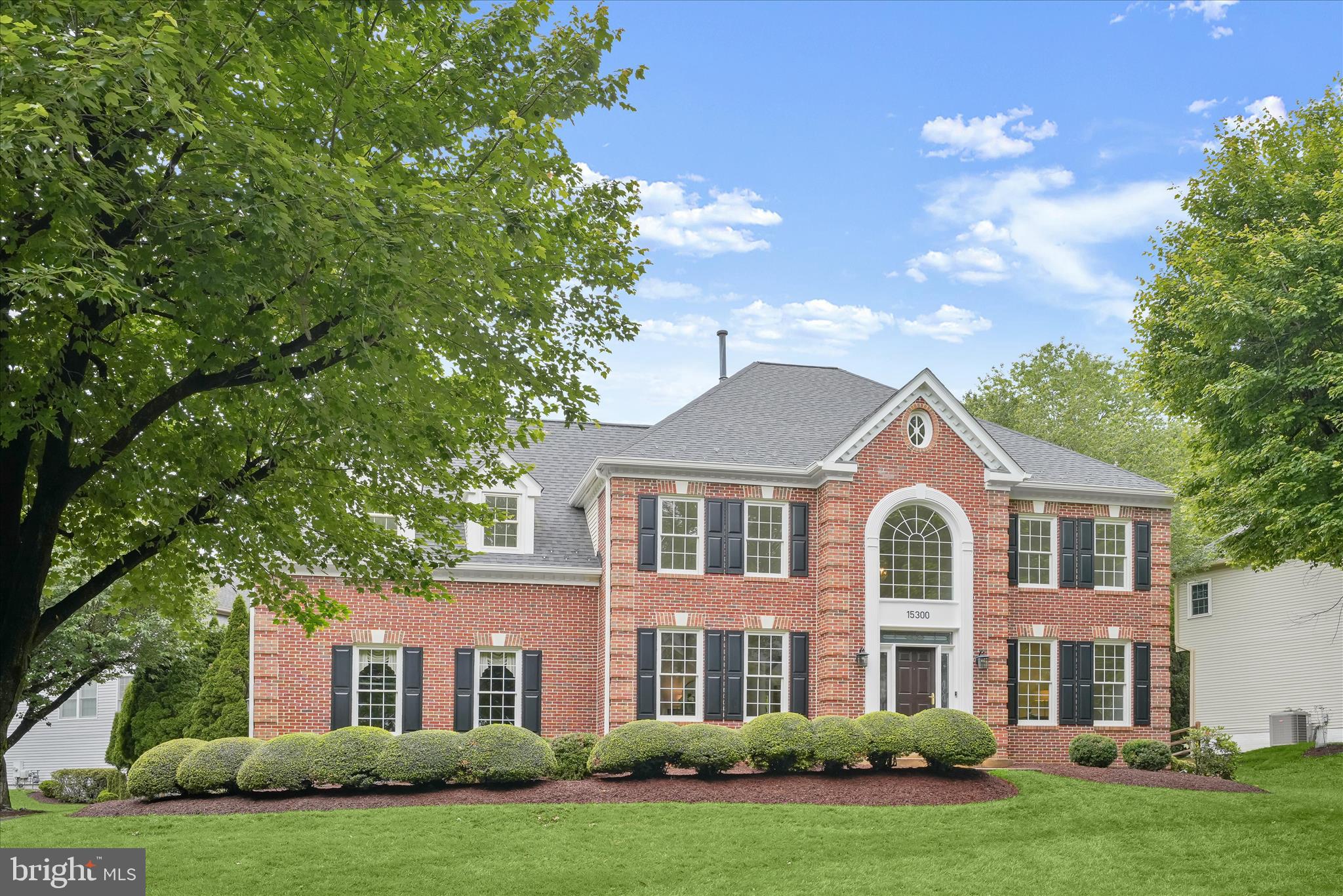 Welcome to 15300 Kwanzan Court, a beautifully updated 5-bedroom, 4.5-bath colonial set prominently on a corner lot with exceptional curb appeal, a side-load two-car garage, and a wonderful fenced backyard. Lovingly cared for by the original owners and significantly renovated in recent years, this spacious home offers a thoughtful blend of classic architecture, modern finishes, and a highly functional floor plan with natural flow across three finished levels.

The main level makes an immediate impression with a dramatic two-story foyer and elegant staircase. Designed for both everyday living and entertaining, this level features a formal dining room, a convenient butler’s pantry, a renovated gourmet kitchen, an inviting family room with a wood-burning fireplace, a private den, a dedicated home office with French doors, a chic powder room, a mudroom, and convenient access to the two-car garage. Access to the large, fenced-in, and flat yard provides an exceptional opportunity for indoor-outdoor living and entertaining. Oversized windows and new flooring throughout the home add a fresh, cohesive feel on every level.

Upstairs, the expansive primary suite is a true retreat, complete with a sitting room, spacious walk-in closet, and a beautifully renovated bath featuring dual vanities, a large walk-in shower, and a luxurious jetted tub. The ideal split-design offers ample privacy with one generously-sized bedroom with its own renovated en-suite bathroom on one side, and two additional bedrooms and one renovated hall bath with dual vanities on the other. The fourth bedroom is a show-stopper with vaulted ceilings, tons of natural light, and two spacious closets.

The finished lower level offers even more flexibility for comfortable living and entertaining. Enjoy a spacious recreation room with natural light, as well as a fifth bedroom with an en-suite full bathroom. With a large additional storage room and multiple additional closets, this level offers ample opportunity for guests, live-in help, work, play, fitness, and more!

Other bonus features for the new owners include the following home improvements: new flooring on upper and lower levels (2026), newly renovated secondary bathrooms (2026), new interior paint (2026), new gas furnace (2025), new kitchen appliances (2023), new flooring on main level (2023), new gutters (2022), new water heater (2021), and new architectural shingle roof (2019). 

Set in the desirable Potomac Grove community, this home offers the best of both worlds: a peaceful, established neighborhood setting with convenient access to shopping and dining in the Kentlands Market Square, Downtown Crown, Rio Lakefront, and more, as well as parks, the planned Belward Campus of Johns Hopkins University, AstraZeneca, and major commuter routes. Make this your new home today!