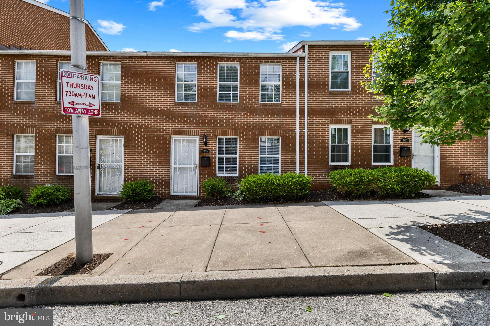 This beautifully updated rowhome is move-in ready and offers the perfect blend of modern finishes and city convenience. The home features brand new LVP flooring throughout both the main and upper levels, new carpet on the stairs, fresh paint from top to bottom, refinished kitchen cabinets, and new kitchen countertops and sink that give the space a fresh, inviting feel. The washer and dryer were replaced in 2024, and a new water heater was installed in 2026, adding even more value and peace of mind. Upstairs, you'll find three spacious bedrooms that offer plenty of room for family, guests, or a home office. Step outside to the fully fenced rear yard, perfect for relaxing, entertaining, gardening, or creating your own outdoor retreat. Conveniently located just minutes from Johns Hopkins Hospital, Patterson Park, Fells Point, the Inner Harbor, downtown Baltimore, major commuter routes, restaurants, shopping, and entertainment, you'll enjoy easy access to everything the city has to offer. This home is ready for its next owner. Some photos have been virtually staged to illustrate the home's potential. Original photos are also included for reference.