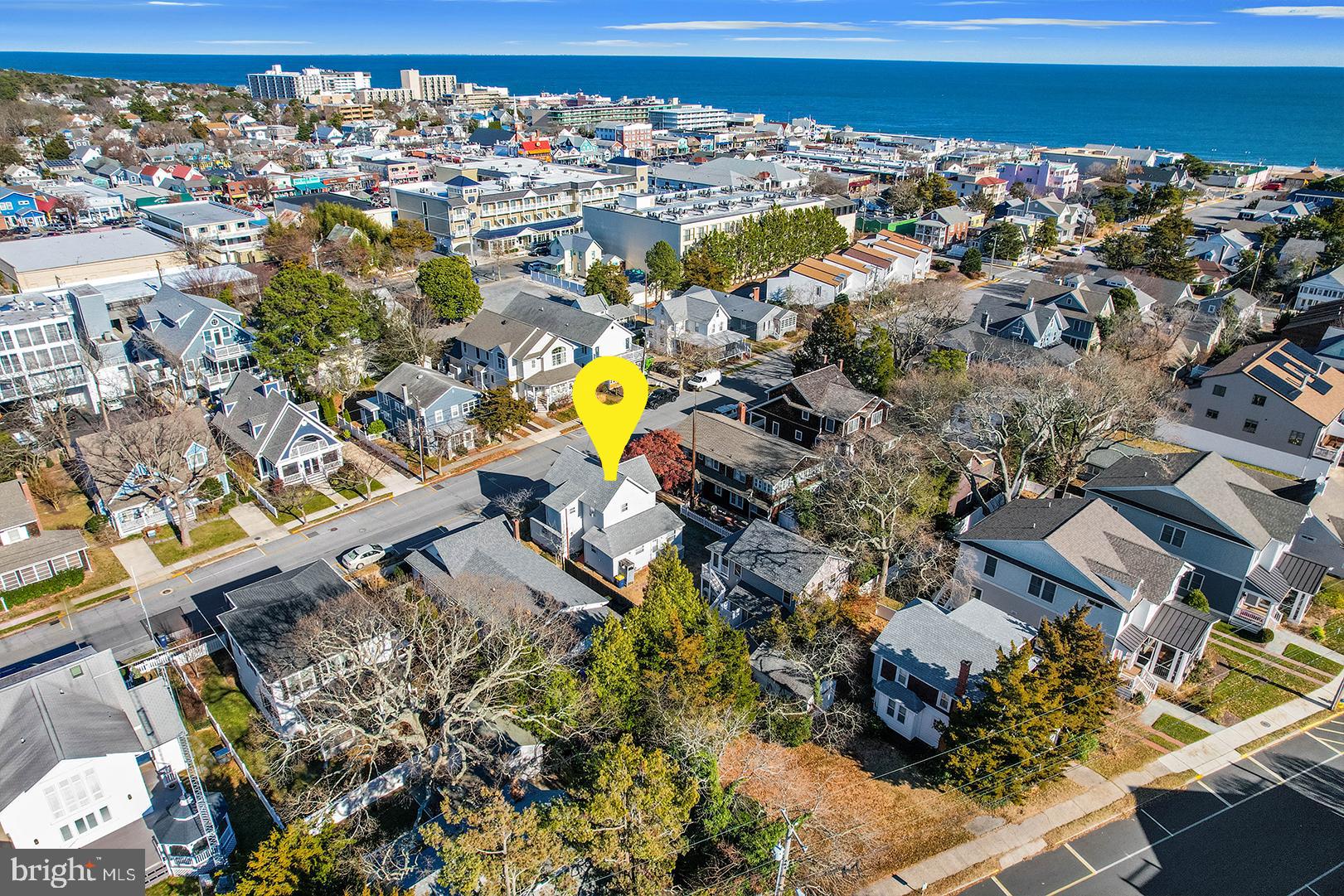 46 Delaware Avenue offers a superb in-town location just 2 blocks to Rehoboth Avenue and less than 2 blocks to the renowned Rehoboth Boardwalk and beautiful beaches. Situated on a 50’ x 100’ parcel, this property offers 3 units in this excellent location. The main house, built in 1925 features a spacious front porch, 4 bedrooms, 3 full baths, and private laundry. The rear 2 apartments were completely remodeled in 2020, beautifully appointed and move in ready. Each of the guest cottage units feature a beautiful front porch complete with vinyl window enclosures that are ideal for extended outdoor living. The 1st floor unit offers an open floor plan, tiled floors with a weathered hardwood look, 1 spacious bedroom, modern bath, partial kitchen with a large quartz island, and private laundry. The 2nd floor unit offers airy vaulted ceilings, 2 bedrooms, 1 full bath, luxury vinyl flooring, updated eat-in kitchen complete with quartz counters, and private laundry. Exterior features include outdoor showers perfect after a long day on the beach, storage shed ideal for bikes and beach toys, and a yard is perfect for barbecuing! 46 Delaware Avenue allows you to comfortably live on site while remodeling the main house to make it your own. This is the ideal vacation and investment property with 3 rental licenses in place!