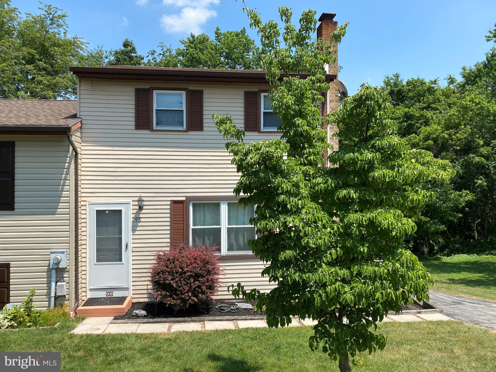 Welcome Home! This very well kept 2 Bedroom, 1 and a half bath townhouse in Valley Green Village is waiting for it's new owner! The finished walk out lower level can easily be converted to a 3rd bedroom. New carpet and paint. Wood fireplace with insert included in sale. West shore schools and a communityplayground/park right across the street. A private back deck for you to relax. A storage shed and separate wood shed are located around back. - HOA includes common area maintenance, playground, fields and bus stop.