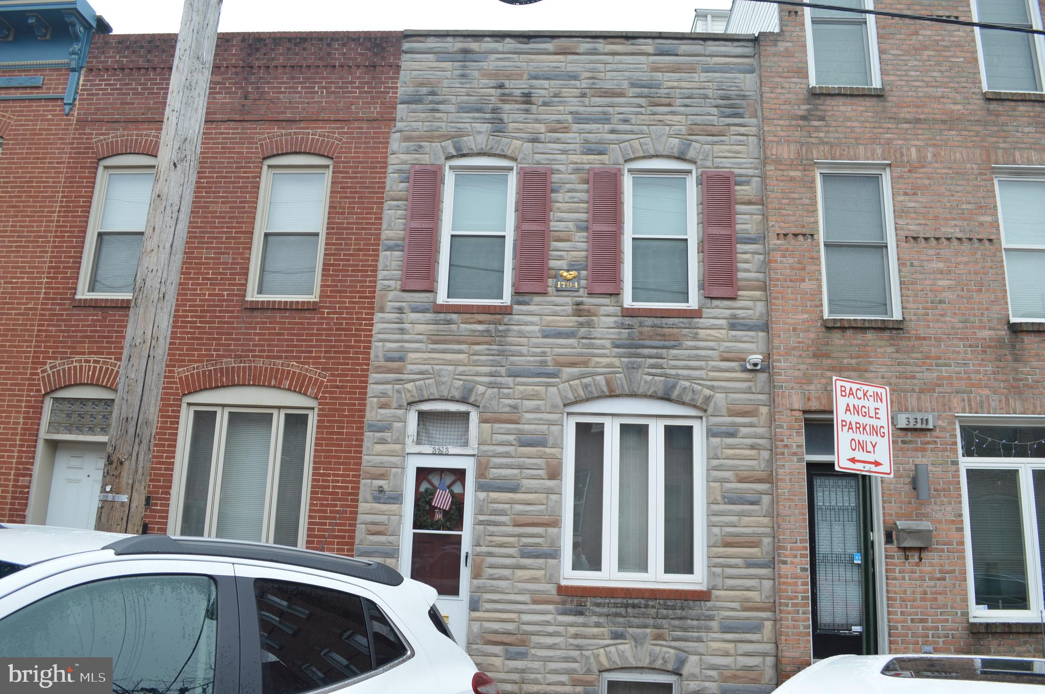 This 3BR home is nealy at the top of the hill in Canton.  Many homes have had roof decks installed.   First floor features 9' ceiling height, giving rooms a bigger feel.   Open stairs across this 14' wide THS to the  2nd floor, where there is a small hall with skylight.   3 bedrooms and full bath on 2nd floor.  This home needs updating in the living space.   Basement level is 6' deep with stairs from the 1st floor and entry/exit door from the basement to the yard.  Toilet area in basement with drain line below the concrete floor.  Good storage and laundry area too.