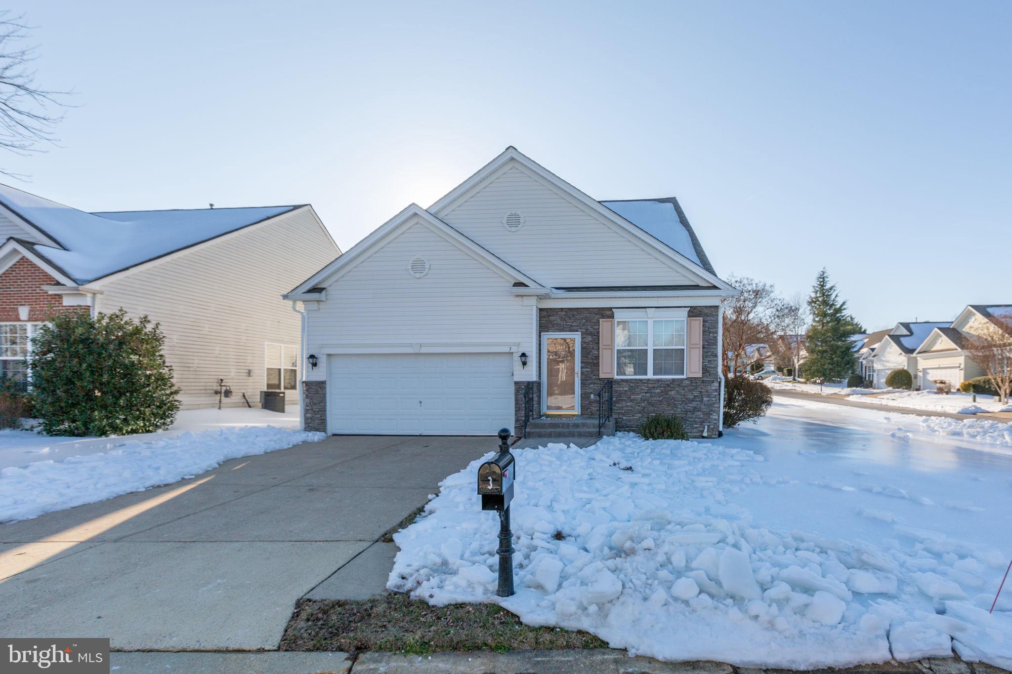 Located in Falls Run, the sought-after Del Webb Active Adult Community in South Stafford, this beautifully situated corner-lot home offers both convenience and an exceptional lifestyle. It is in excellent condition and pride of ownership shines through.

Positioned near the front gate, this home welcomes you on the main level with an expansive great room featuring sun-filled windows, soaring ceilings, and a cozy gas fireplace—perfect for everyday living or entertaining. Tucked off the main living area is a private guest bedroom and full bath, offering comfort and privacy for visitors.

Straight ahead, the well-appointed kitchen impresses with custom cabinetry, a stylish backsplash, granite countertops, stainless steel appliances, and easy-care ceramic flooring. The center island and abundant counter and cabinet space make meal prep a breeze, while the informal dining area opens to a brand-new composite deck, ideal for enjoying sunny afternoons or morning coffee when this winter weather improves.

Secluded at the rear of the home, the oversized primary suite provides a peaceful retreat with corner windows, a spacious walk-in closet, and a well-designed primary bathroom. Hardwood floors throughout the main level, with the exception of the kitchen, make it easy to navigate and the warm wood tones are beautiful.

Upstairs, a versatile loft sitting area leads to a private upper-level hideaway—perfect as an art studio, home office, or guest suite—complete with a third bedroom, two closets, and a full bathroom. Fresh paint and abundant natural light enhance every space upstairs.

The fully finished lower level offers endless possibilities for a train enthusiast, hobbyist, workshop devotee, or storage aficionado. Thoughtfully engineered with French drains and a sump pump, this space is designed to stay dry and functional. An additional exit provides easy access to the backyard, stamped concrete patio, and deck, seamlessly connecting indoor and outdoor living.

This home delivers space, flexibility, and an engaging community lifestyle—all in one exceptional Falls Run setting.  Just minutes from the commuter lot, downtown shopping, dining, and medical facilities, you’ll also enjoy being only steps from the Falls Run Community Center, where a full-time Lifestyle Director curates a robust calendar of activities, trips, and social gatherings. Come see it today!