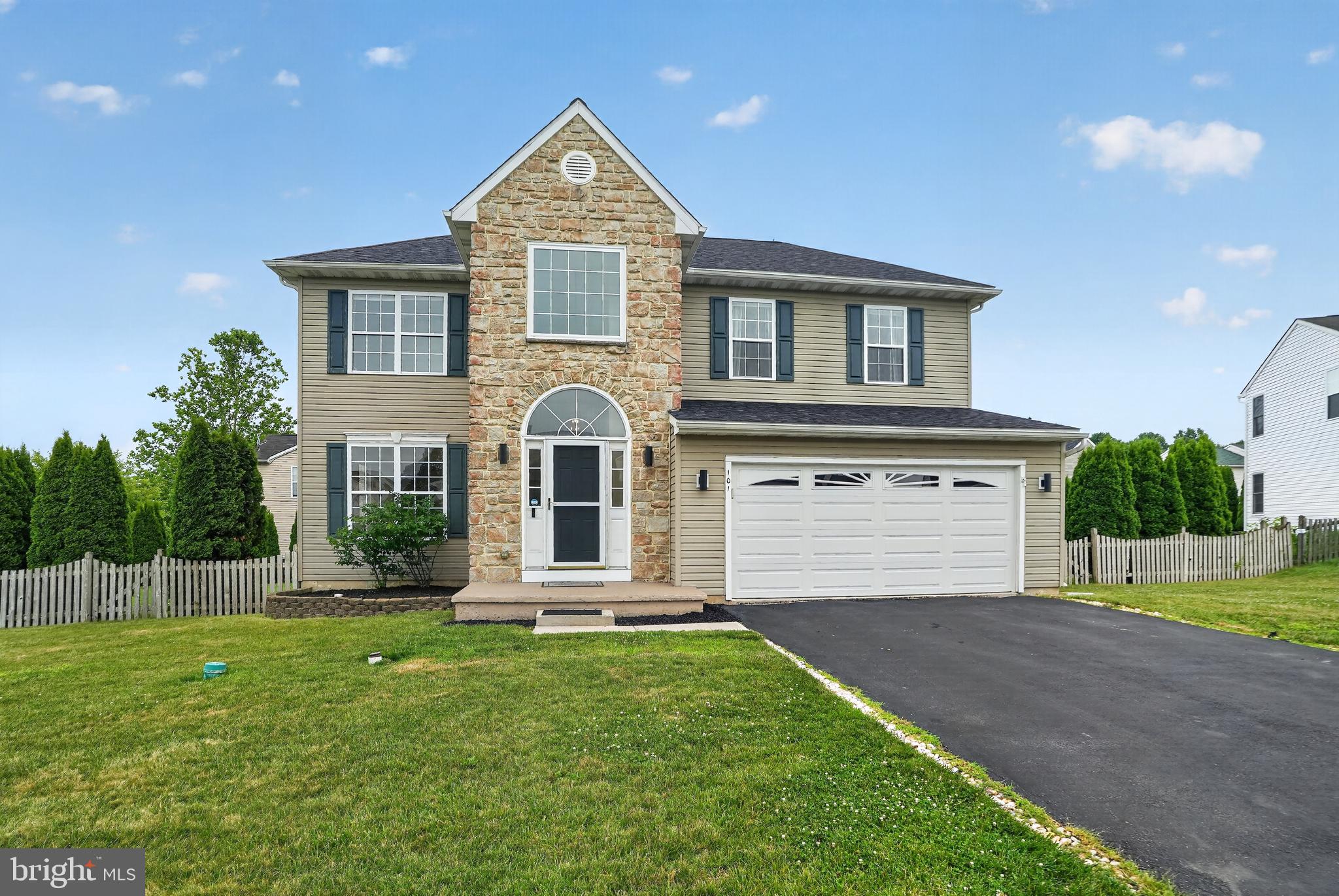 Welcome to this beautifully maintained 4-bedroom, 2.5-bath home featuring a finished basement, fenced backyard, and numerous recent improvements that make it truly move-in ready.  Freshly painted throughout the first and second floors, this home offers a bright, modern feel from the moment you step into the impressive two-story foyer.  The main level showcases brand-new luxury vinyl plank flooring throughout and an open-concept layout perfect for today's lifestyle. The formal living and dining areas flow seamlessly into the spacious eat-in kitchen, complete with a large center island, stainless steel appliances, and tile backsplash. The kitchen opens directly to the inviting family room featuring a cozy gas fireplace, creating the ideal space for entertaining and everyday living. A convenient powder room completes the first floor.  The fully finished basement adds valuable living space and features brand-new carpeting, a built-in bar, and additional storage areas—perfect for a recreation room, media room, home gym, or game-day gatherings.  Upstairs, the spacious primary suite offers a large walk-in closet and a private en-suite bath. Three additional bedrooms and a full hall bathroom provide plenty of room for family, guests, or home office needs.  The convenience of a second-floor laundry room makes everyday chores easier and keeps everything right where you need it.  Step outside to a generously sized deck overlooking the level, fully fenced backyard, providing the perfect setting for outdoor entertaining, pets, play, and added privacy.  With fresh paint, new LVP flooring, new basement carpeting, an open floor plan, and exceptional indoor and outdoor living spaces, this updated home offers everything today's buyers are searching for. Don't miss the opportunity to make this beautiful property your next home!