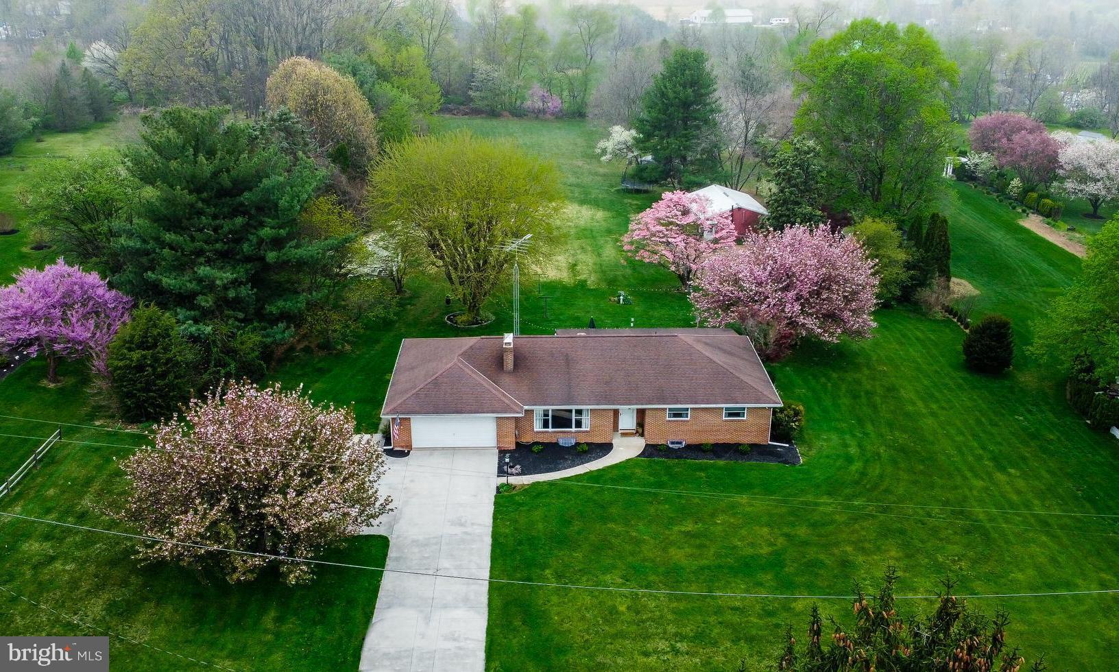 Welcome to your own little slice of heaven; minutes from Codorus State Park and yet still next door to all of Hanover‘s shopping and restaurant amenities! Pride of ownership is revealed in this beautifully updated 4 bedroom, 2 full bath rancher situated on over 2 1/2 acres! New engineered hardwood flooring in 2020! Kitchen remodel in 2020! Primary suite added in 2019! Heated finished basement family room with wood burning fireplace! Insulated 24 x 32 steel pole building with electric! Charming potting shed and fenced in garden are all ready for your green thumb ambitions! From the spacious interior flow to the screened in porch & patio area, you‘ll love the everyday function as well as entertainment possibilities! Relax after gardening and hobbies next to the ambiance of a cascading waterfall & fishpond! Bring your people to this new place to call HOME and start living the dream! Schedule your showing appointment today!