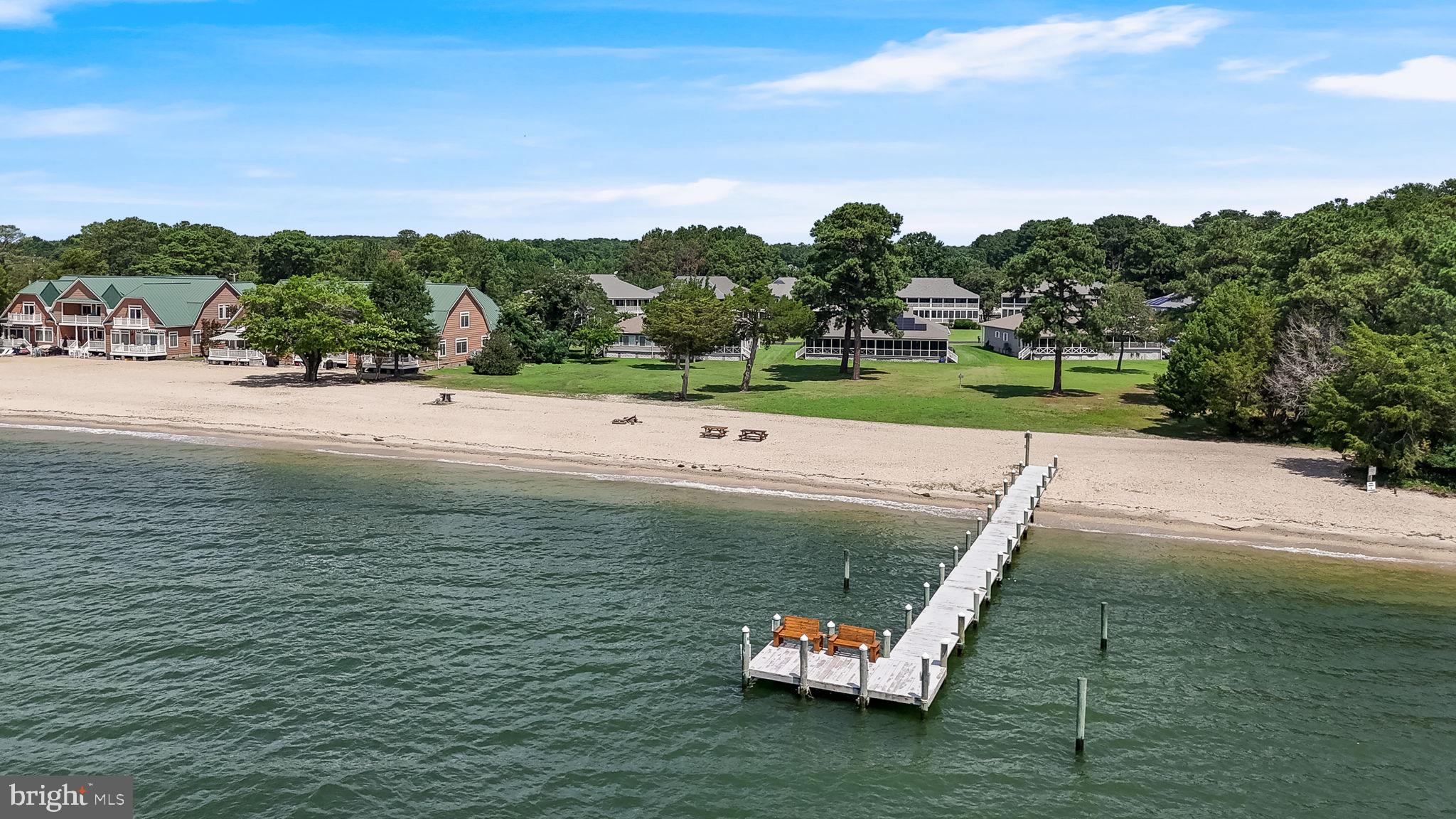 Welcome to 17265 Crab Pot Lane, Piney Point, MD, a breathtaking 4-bedroom, 3-bathroom haven that exemplifies the perfect blend of luxury and tranquility. This home has undergone a complete professional renovation, offering the utmost in modern amenities and stylish finishes.

Step inside to discover the allure of all-new high-end LVP flooring that spans throughout the entire home, providing a seamless and sophisticated appeal. The kitchen is a chef's dream, boasting brand new appliances, quartz countertops, and a ceramic subway tile backsplash that adds a touch of elegance to your culinary adventures. An elegant wrought iron railing leads you to the upper level, where new light fixtures illuminate the way. 

The oversized 2.5-car garage, with epoxy floors and additional overhead storage, provides ample space for all your vehicles and belongings, keeping everything tidy and organized.

Enjoy the breathtaking waterfront views from the two large back porches, making them the perfect spot for morning coffee or evening relaxation while watching the sunset over your private sandy beach. Picture yourself surrounded by lush landscaping provided by the HOA, giving you the freedom to relish in the beauty of your surroundings without the upkeep.

With a two-year-old roof and HVAC, and a new hot water heater, your home's major systems are worry-free, allowing you to focus on creating cherished memories in this private community haven.

As a bonus, the private pier offers you the chance to indulge in fishing and crabbing to your heart's content. Imagine spending your weekends immersed in nature's wonders right from your backyard.

Embrace a lifestyle of pure serenity and luxury at 17265 Crab Pot Lane. This impeccable retreat with its complete renovation and stunning water views awaits you. Seize this rare opportunity to make it yours and elevate your living experience to new heights.