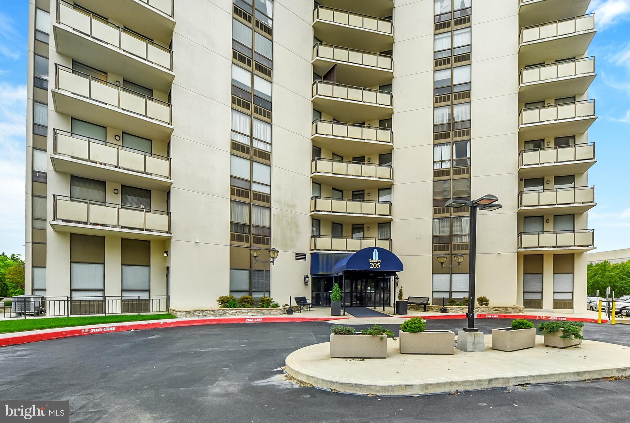 Discover a captivating blend of comfort and convenience in this charming 1-bedroom, 1-bathroom unit with new carpeting and paint to welcome you, located in the highly sought-after Ridgely Towson Center. Nestled within the elegant high-rise building known as The Ridgely, this residence offers a lifestyle that harmonizes modern living with community spirit. Step inside to find a thoughtfully designed interior featuring a primary bedroom with very large walkin closet, kitchen with plenty of storage, dining area with beautiful built in storage living area with awesome balcony walk out perfect for entertaining or enjoying quiet evenings at home. The unit is equipped with in-unit laundry facilities, ensuring that your daily routines are as effortless as possible. With ample natural light streaming through the windows, the space feels warm and inviting, ready for you to make it your own. The exterior of the building boasts a range of amenities that elevate your living experience. Enjoy the luxury of a community swimming pool, perfect for those sunny days, or take advantage of the fitness center to maintain an active lifestyle. The building also features 24-hour security, providing peace of mind, and a welcoming lobby desk to assist residents and guests alike. Reserved parking ensures that your vehicle is always close at hand, while the well-maintained grounds reflect the pride of the community. Living in Ridgely Towson Center means embracing a vibrant neighborhood filled with benefits. The community is known for its friendly atmosphere. Excellent public services and nearby schools enhance the appeal of this location, making it a perfect choice for those seeking a well-rounded lifestyle. Conveniently situated near shopping, dining, and entertainment options, this property offers the best of both worlds-urban excitement and suburban tranquility. Whether you're exploring local boutiques or savoring a meal at a nearby restaurant, everything you need is just moments away. This is more than just a home; it's a lifestyle choice that invites you to experience the best of community living. Don't miss the opportunity to make this delightful unit your own and enjoy all that Ridgely Towson Center has to offer!  Recently appraised, instant equity at this price!