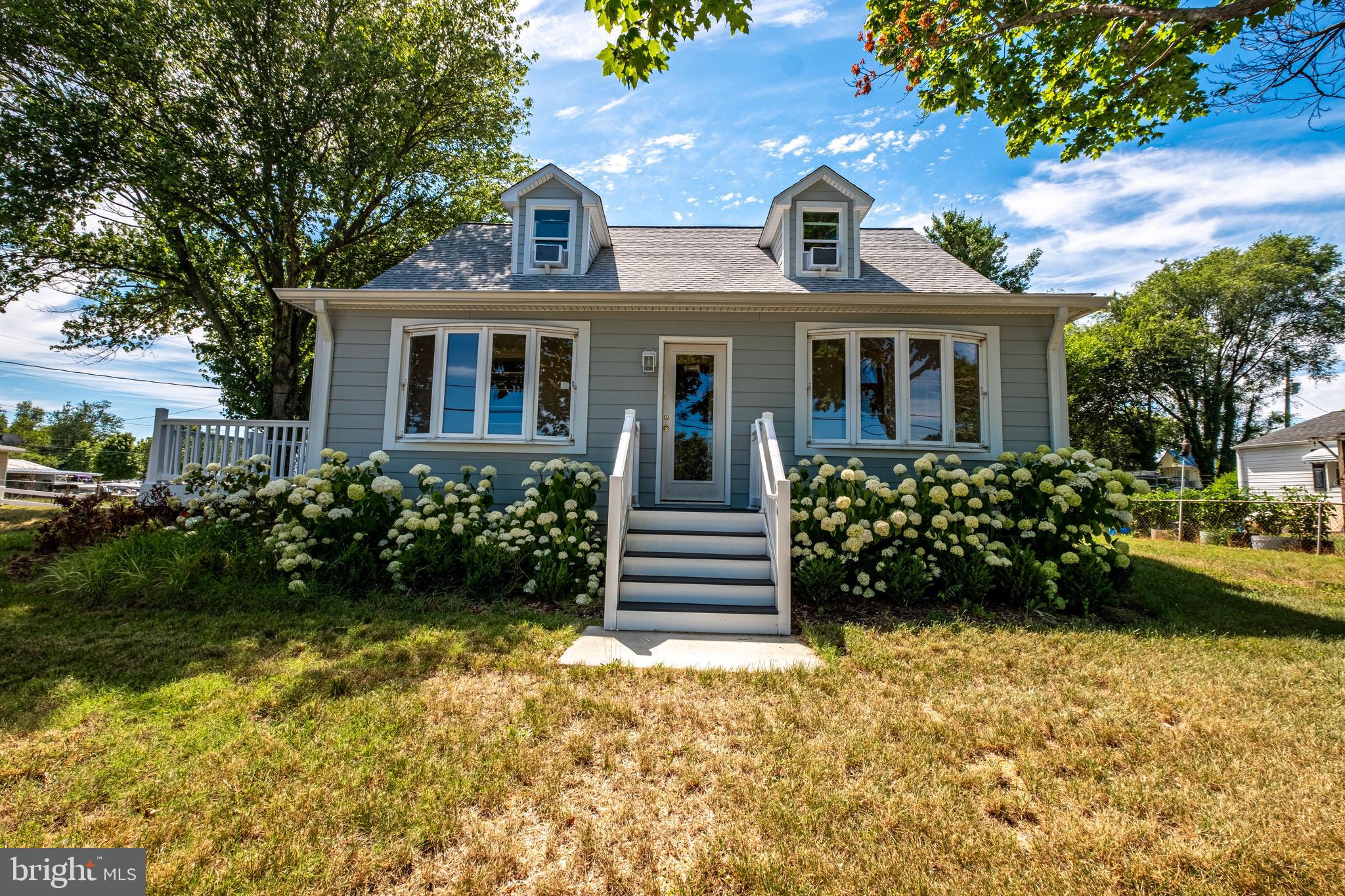 Renovated Waterview Retreat in Historic Benedict.  This beautifully renovated 4-bedroom, 2-bath Cape Cod seamlessly blends timeless character with modern updates nestled on an oversized lot with views of the Patuxent River in the charming waterfront community of Benedict. Original hardwood floors have been thoughtfully refinished, while updated lighting, fixtures, and appliances provide contemporary comfort. The upper level features two spacious bedrooms with stunning views of the Patuxent River, along with a full bath conveniently located off the main hallway. On the main level, you'll find a generous primary bedroom with an adjoining sitting room, an additional bedroom ideal for guests or a home office, a separate dining room, and a spacious living room. Take in breathtaking river views from the expansive side deck or unwind year-round in the sunroom overlooking the water. Whether entertaining guests or enjoying a quiet evening, the setting is truly exceptional. Two outdoor storage sheds convey with the property, offering additional space for tools, equipment, or hobbies. As an added bonus, the oversized lot may offer future subdivision potential as the lot spans the entire length of Kennon Place from Benedict Avenue to Mill Creek Road. A rare opportunity to own a move-in-ready home with water views, historic charm, and future investment potential. MOTIVATED SELLER.