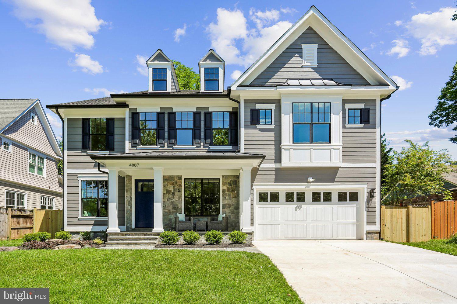 100% Completed!! Amazing 5 bedroom, 4.5 bathroom home with over 4,900 square feet of living space built by Award winning Douglas Construction Group! This magnificent home has all the modern details including high ceilings, oversized windows, hardwood floors, custom fixtures and recessed lighting. The main level features a formal dining room, living room, family room with gas fireplace and built-ins, den, mud room, powder and a covered porch with a grilling patio. The gourmet kitchen includes high end appliances, a center island, breakfast area, pantry and a butler’s pantry with a beverage refrigerator. On the upper level you will find a lovely primary suite with two walk-in closets and a spa bath with a glass enclosed frameless shower, soaking tub and dual vanities. The upper level also includes a family/homework-study area, 3 additional bedrooms, 2 additional bathrooms and a laundry room. On the fully finished lower level there is a spacious recreation room, a dry bar with a beverage refrigerator, exercise room, storage room, 5th bedroom, 4th full bathroom and plenty of extra storage space. Attached 2 car garage! Elevator ready! Part of the Bethesda Chevy Chase High School cluster. May 2026 Delivery.