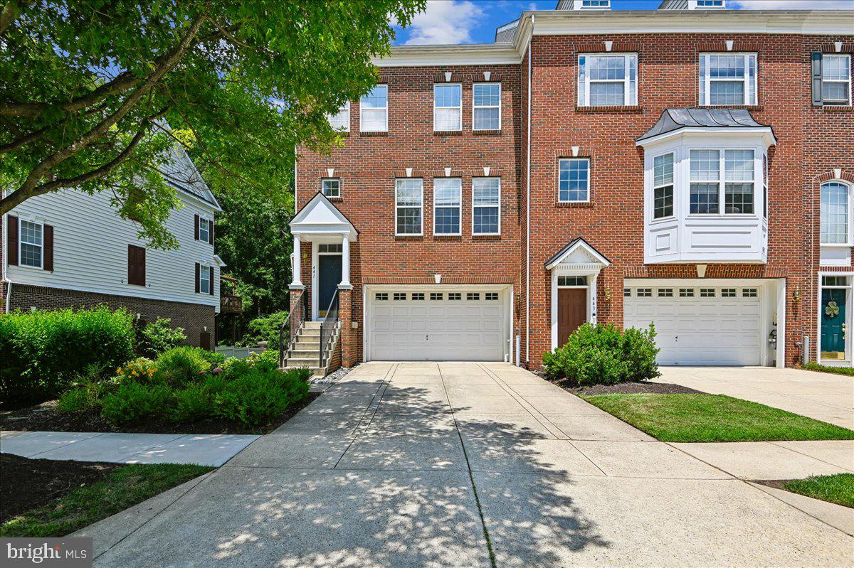 441 Penwood Drive is a master class in contrast and balance.
Welcome to The Pointe, a cluster of colonial-style townhomes within the sought-after South River Colony community, where residents enjoy amenities including two pools, basketball, tennis, and pickleball.

This end-of-row townhome presents a classic exterior. Once inside you’ll discover a completely contemporary esthetic. First, you notice the gleaming hardwood floors, turn to your left and the main floor is anchored by the sleek updated kitchen. Sleek cabinetry, quartz countertops, and a crisp tile backsplash create a clean, contemporary aesthetic. The large stainless-steel refrigerator collaborates with the stainless range hood to show you that main character energy. Open the sliding glass doors to the expanded and reinforced deck. Connect with nature while sipping morning coffee. The deck is also an ideal place to entertain, unwind and connect. Your view is a serene 100 acre preserve with color coded walking trails and abundant flora and fauna.

Upstairs, you’ll find three bedrooms, two full baths, and the conveniently located laundry. The primary suite continues the home’s theme of contrast and balance, offering a sophisticated, spa-inspired bathroom. A striking monochrome palette sets the tone, with charcoal ceramic tile floors grounding the space. The double vanity features crisp white cabinetry paired with coordinating sinks for a clean, modern look. The shower elevates the design further with organic cut pebble flooring, ceramic tile surrounds, a built-in niche, balanced with sleek chrome fixture to create a chic retreat reminiscent of a boutique hotel.  The bedroom has a pair of walk-in closets to provide abundant storage. Gaze out the window, and treetop views provide a peaceful, natural counterpoint to the interior’s refined style. 

Picture this: Your weekend morning could be a walk to Black MarketBakers or Rise Up Coffee and coming soon, Nico’s Bagels and Brunch. The wooded walking trails of SRCC connect to the post office and Main Street, the vibrant hub of this 1400 acre Planned Unit Development. Here you’ll find over a dozen dining options, a lively game shop, Wyrd, an independent bookstore, and many other beloved local spots.  For more culture, Baltimore’s sports, arts, and dining scene is just about an hour away, while New Carrollton Station is a 20-minute drive for easy access to DC via Metro or further away on Amtrak. If you are seeking a sophisticated, well-balanced home with great connections, schedule your private showing now!