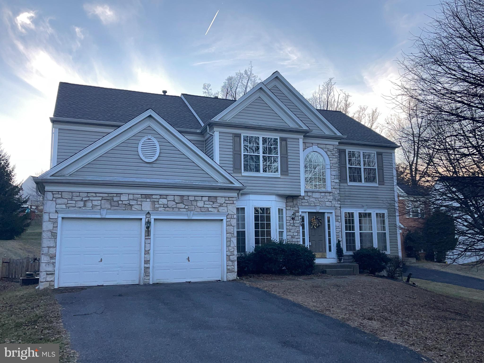 Welcome to this  4 bedroom, 3 full and 1 half bath home in Autumn View.   Spacious kitchen opens to family room with gas fireplace and Florida/Sunroom. Refinished hardwood floors on Main Level. Deck overlooks  fenced in yard.  . Upper level boasts 4 bedrooms and 2 full baths & New Carpet.  Bedroom 4 is currently used as a walk-in closet.  Lower level features enormous open space, 2 separate rooms ideal for office or home gym and storage.   Basement also includes a full bath.   2 car attached garage and 4 parking spaced drive way.
Home is commuter convenient to I95, I29 & I70    Newer Roof  in 2019