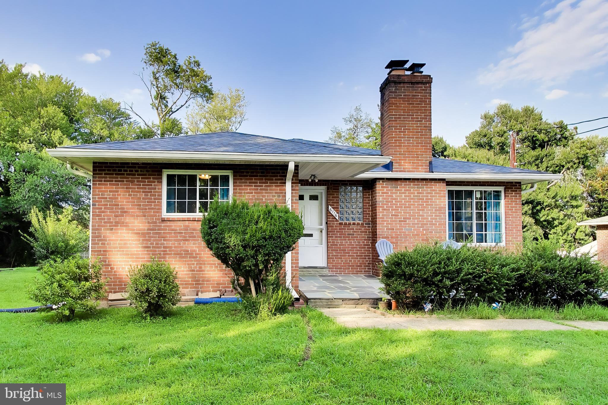 Welcome to this light and bright all-brick two-level Rambler sited on level, fully fenced .26 acre lot.  Enjoy over 2,000 sq ft of finished space on two levels, with plenty of space for all. Well maintained, but with some updates would be spectacular. Sweeping living room with a cozy wood-burning fireplace and adjoining dining area, hardwood floors, and replacement windows. Good sized kitchen ready for your vision and renovation ideas. There are 3 sizable bedrooms, and a full bath on the main level.  The fully finished walk-up level basement features a rec-room, two bedrooms, and a kitchenette-perfect for an au pair suite, extended family living, or potential rental flexibility. Ample storage space can be found throughout. Step outside to enjoy the fully fenced, flat backyard—perfect for pets, play, gardening, or outdoor entertaining. Other major updates include: Roof: (2024), windows (2024), HVAC (2014), Water heater (2020). For ease of transition, property sold as-is. Commuter's dream, just steps to bus & short drive to WFC Metro, places of worship, minutes to Seven Corners, Bailey's Crossroads, Amazon HQ2, and D.C.