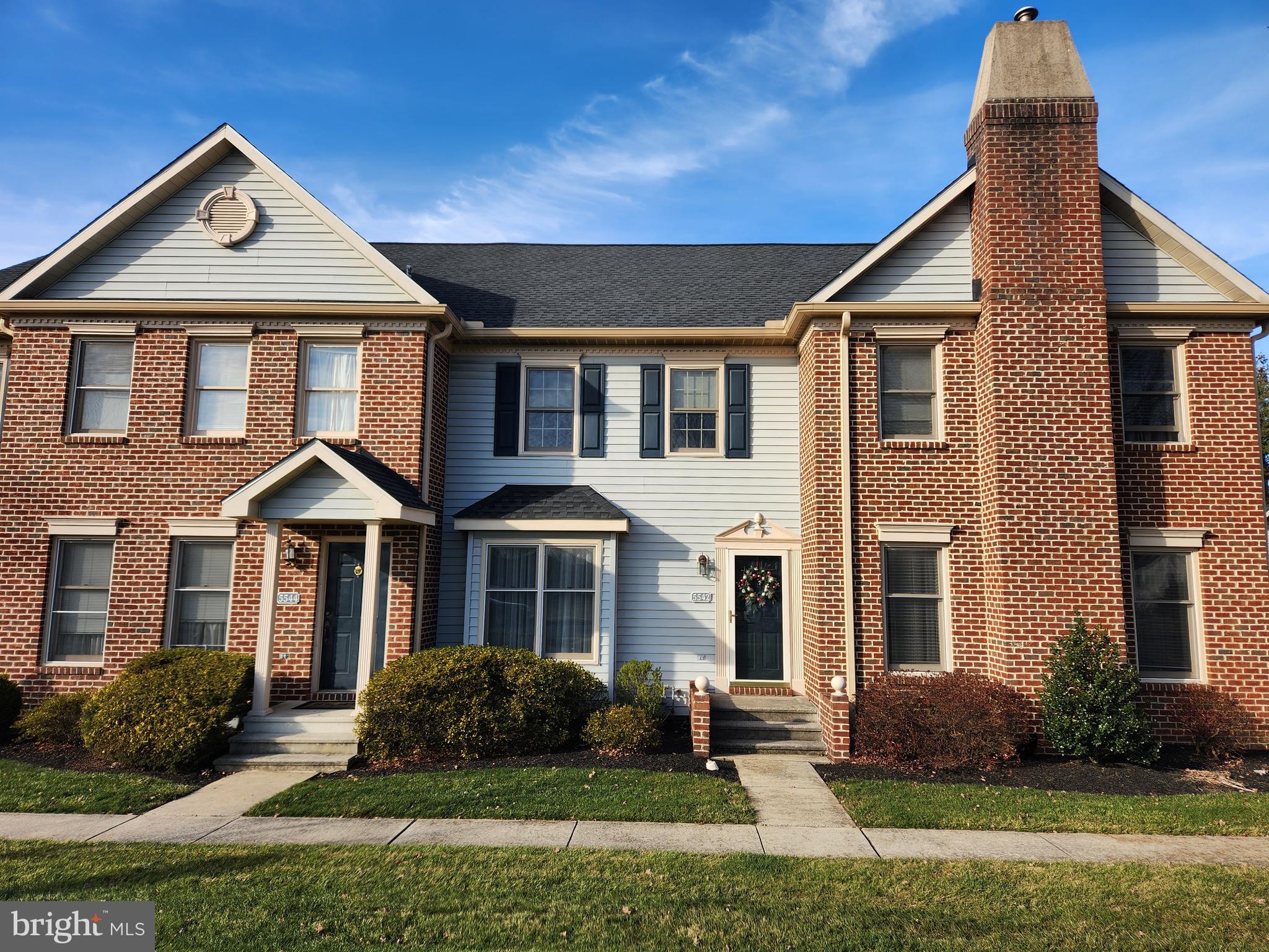 Located on a lovely street in the Village of Moreland, this condo offers a low-maintenance lifestyle. Step inside to the spacious open floor plan with new durable luxury plank flooring throughout the main level. 
The living and dining area lead to a remodeled powder room and updated kitchen.
Enjoy the ease and efficiency of having laundry facilities on the main level.
 Upstairs has new carpeting and two primary suites with vaulted ceilings, each with a private bath and ceiling fans.
Sunlight streams through the kitchen patio door, illuminating the space with natural light.
Step through the patio doors onto a private deck courtyard, where outdoor relaxation and entertainment await. A retractable awning provides shade on sunny days, making this courtyard more versatile and comfortable. The unique feature of the courtyard is its direct access to a 2-CAR-GARAGE, providing both convenience and security. 
Washer, dryer & refrigerator convey.