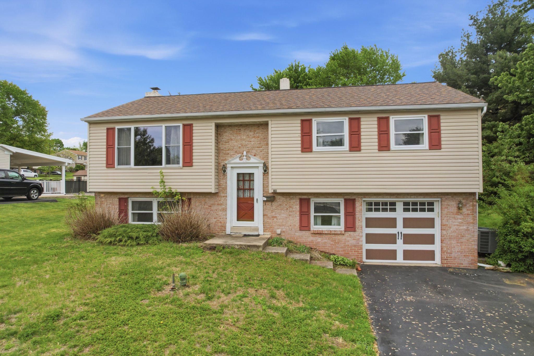This bi-level home sits on a quiet street in Red Hill.  On the main level, the layout includes a spacious living room with a picture window; dining room; full kitchen; three bedrooms; and a full bath.  There is plenty of closet space here, too.  The lower level features a family room with fireplace and newer sliders offering convenient walkout access to the patio and backyard; a fourth bedroom or flexible space for an office or exercise room; a half bath; and laundry room/mudroom with access to the garage.  In addition to the attached garage, there is additional parking in the driveway and on the street.  Washer and dryer and fridge remain with the home for the convenience of the buyer.  There are an abundance of parks in the Upper Perk Valley, both county and municipal. Nearby Red Hill Park offers a playground and more; and Green Lane Park, part of the Montgomery County Park system, is throughout the area.  Green Lane Park offers 3400 acres of parkland and 20 miles of trails with a multitude of recreational opportunities including hiking, fishing, boating, horse trails and playgrounds.  This home is ready for you to make it your own.  Please note, this home is being sold “as is”, i.e., buyers are welcome to have inspections but should expect no repairs or credits in lieu of repairs as a result of those inspections.