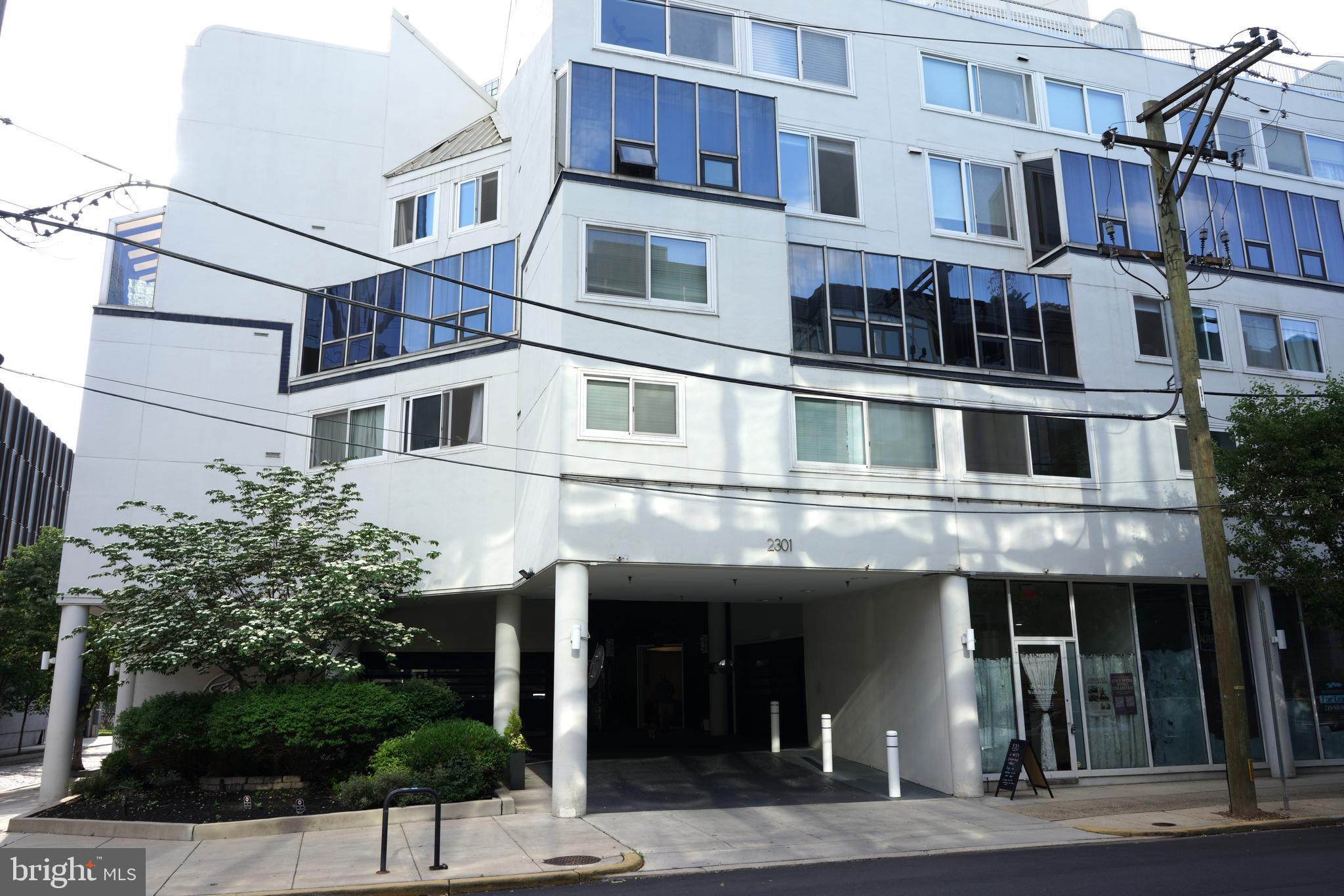 Welcome to Rivers Edge Condominiums, a hidden gem nestled at the corner of 23rd and Cherry Streets, just steps from Center City Philadelphia’s vibrant attractions. Perfectly positioned along the scenic banks of the Schuylkill River, this location offers effortless access to 30th Street Station, the I-76 Expressway, and the newly revitalized Schuylkill River Park—with its picturesque walking and biking trails that lead to historic Fairmount Park.
This well-maintained building houses 96 units and features a rooftop deck with sweeping views of the city skyline—an ideal spot to soak up summer sun or enjoy the dazzling Fourth of July fireworks. Unit 3A offers a private north-facing balcony with partial views of the Philadelphia Museum of Art, the Schuylkill River, and 30th Street Station. Included with the unit is designated parking space U9 in the secure, on-site garage—at no extra cost.
The condo association has approved a comprehensive façade and window replacement project scheduled for 2024–2027, and it is delayed. For Unit 3A, the special assessment is $124,264. The seller has already paid the first 50% ($62,132) of assessment in 2025, while the remaining balance will be assumed by the buyer.
