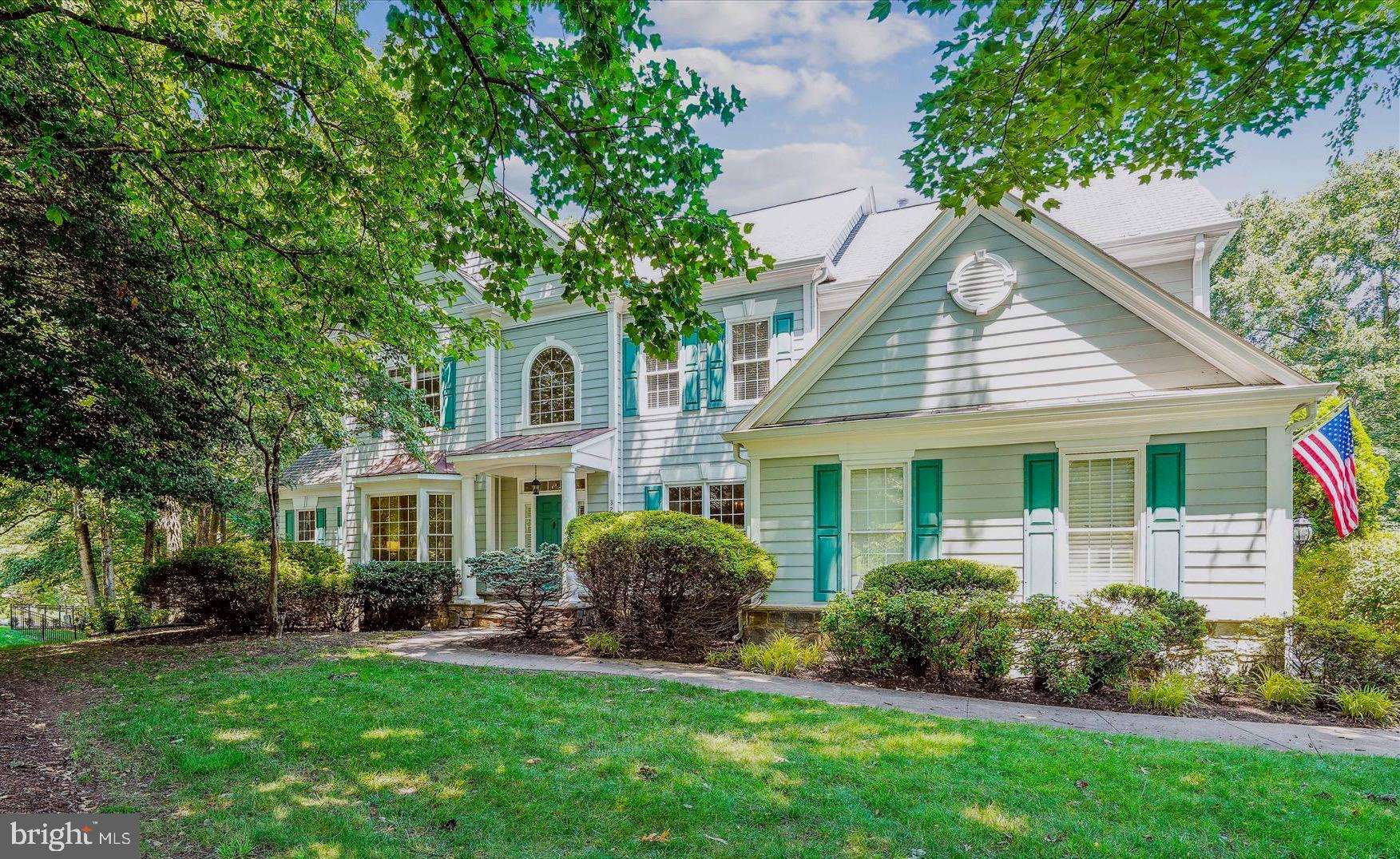 PRICE REDUCED!!!  INCREDIBLE VALUE!  Breathtaking Pulte-built Hampton II model on the perfect .89 Acre corner lot in the heart of Oakton, the sought-after neighborhood of Wheatland Farms. Curb appeal to the max! Walk to Difficult Run Trails from this stunning 5 Bedroom, 4.5 Bath home, offering approximately 7,350 square feet of light-infused space. In addition to 4 upper-level bedrooms, this thoughtfully designed home even offers an Au Pair or in-law suite with a Living Room, Bedroom and Full Bath in the full daylight walk-out lower level.  The welcoming columned Portico ushers you into the two-story foyer with marble flooring. It's flanked by the Living Room and formal Dining Room, both sharing hardwood floors and elegant architectural detailing. The Living Room features a charming bay window overlooking the front garden, while the Dining Room presents Crown Dentil Molding, Wainscoting and an exquisite ceiling medallion. The perfect space to host your next dinner party!  The Conservatory, off the Living Room through French doors, is breathtaking. It features a cathedral ceiling and wooded views through 3 windowed walls. Then, at the heart of the main level, sits the two-story Great Room, with soaring windows and a floor-to-ceiling stone Gas Fireplace. It is absolutely wide open to the Kitchen and Breakfast Room. You will love the open concept floorplan of these rooms! The Kitchen is an epicurean’s delight, with GE double Wall ovens, a KitchenAid dishwasher and refrigerator, and an abundance of Maple Cabinetry. A large central island with granite countertop offers plenty of workspace and a 5-burner GE Monogram gas cooktop. A walk-in Pantry provides additional storage, while a Kitchen desk provides convenient workspace. It's open to a large Breakfast Room and provides access to the no-maintenance Deck overlooking the fenced backyard.  It also enjoys access to the Mudroom and Laundry Room. A main level Study features a gracious bay window overlooking the backyard. It offers a wall of Built-ins as well as Crown Molding. A guest Powder Room completes the main level. The Upper level offers 4 large Bedrooms, including a spectacular Owner's Retreat. It features a deep tray ceiling with molding and a sitting area with a romantic Gas fireplace with built-in bookcase surround. It also opens to a luxurious Primary Bath with 2 Vanities, a walk-in Shower, a separate soaking tub and a private water closet. It also offers a spacious walk-in closet. There are 3 generously proportioned ancillary Bedrooms... one enjoys a private bath while 2 share a Jack 'n Jill Bath. The upper-level landing presents dramatic views of the Foyer and Great Room. The expansive full daylight lower level offers seemingly endless space and can easily accommodate multi-generational living. There is a Family Room with Gas Fireplace that enjoys access to the patio and yard beyond, a Recreation Room (with rough-in for a Wet Bar), a Game Room, and Den/Storage Room. … But, wait for this!  A large Au Pair or In-Law Suite offers a Living Room, Bedroom and Full Bath. This is the ideal flex space to use to suit your family's needs! Outdoors, you'll find an enormous, fenced Backyard, a Deck, Patio and a Playset for the kids. Beautiful mature trees provide dappled shade around the yard. The 2-car garage offers an EV charging station and there is plenty of space for additional parking in the driveway.  Updates include: Hardwood floor Kit & Breakfast Rm 2025; Central Vac 2025; Main & Upper HVAC 2024; EV charger 2022; Fence 2022; Water Htr 2022; LL carpet 2022; Roof 2015; Conservatory HVAC 2009. All of this --- just minutes away from Fairfax Corner, Vienna Metro, Tysons, Reston and major commuter routes. Walk to Difficult Run trails!  Oakton High School Pyramid. AS-IS.  THIS IS A ROCK-BOTTOM PRICE.