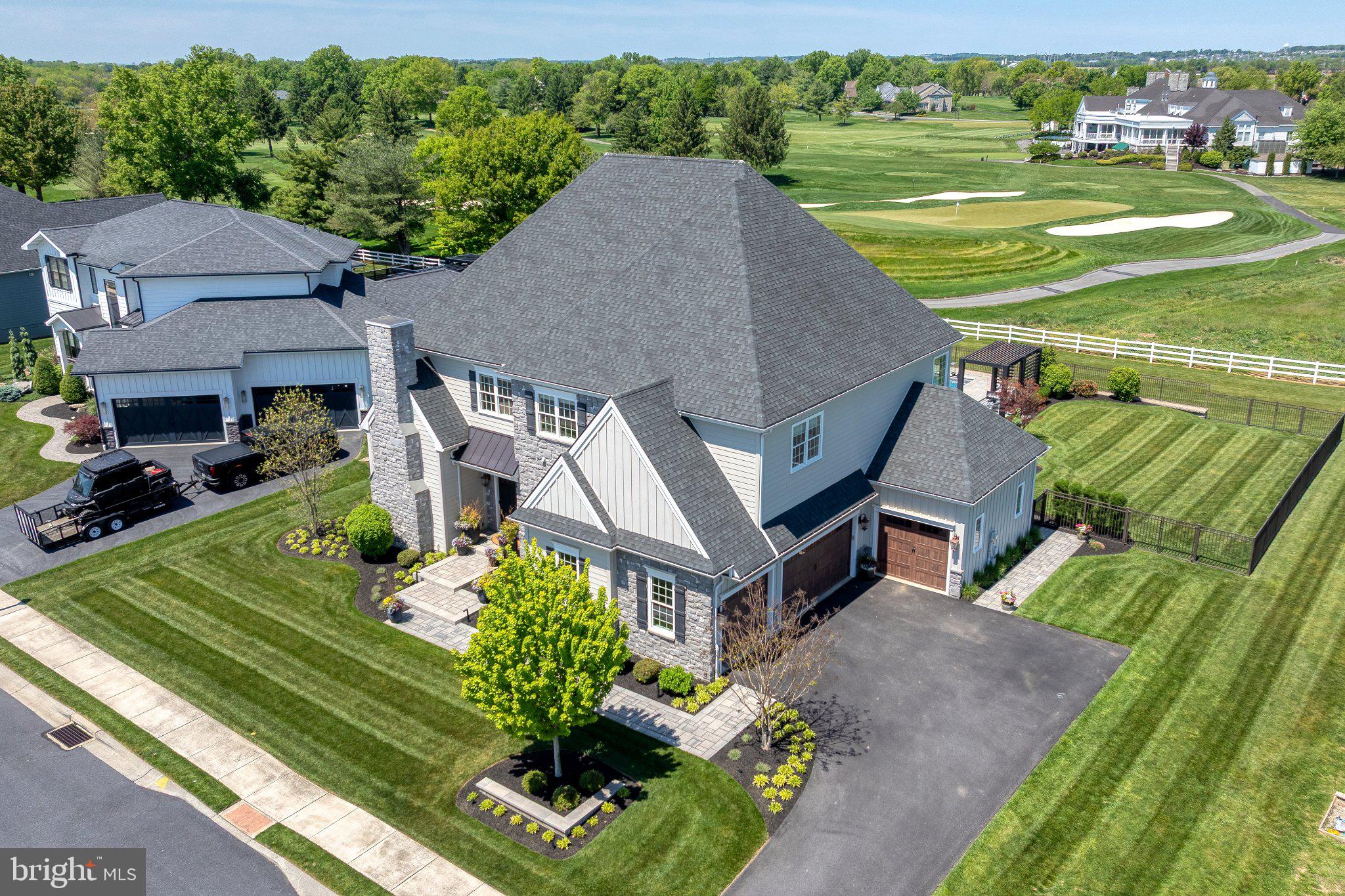 Discover unparalleled luxury in this exquisite 5-bedroom, 5.5-bathroom residence nestled in the prestigious Essex Court community. Built in 2017 and extensive outdoor renovation in 2019, this traditional masterpiece boasts 6,512 sq. ft. of meticulously designed living space. Step inside to find elegant hardwood flooring and a stunning combination dining/living area, perfect for entertaining. The gourmet kitchen features a spacious island and high-end appliances, including a gas range, built-in microwave and double oven. Enjoy cozy evenings by one of the two gas fireplaces or retreat to the fully finished basement. Outside, indulge in your private oasis with a heated saltwater pool, extensive hardscape, and 3 season screened in porch, all while overlooking the lush golf course views. The property also includes a side-entry 4-car garage and ample outdoor lighting, enhancing its curb appeal and outdoor entertaining. Located just minutes from the Lancaster airport, this home offers an exclusive lifestyle that seamlessly blends luxury and convenience. Experience all the amenities this estate has to offer!