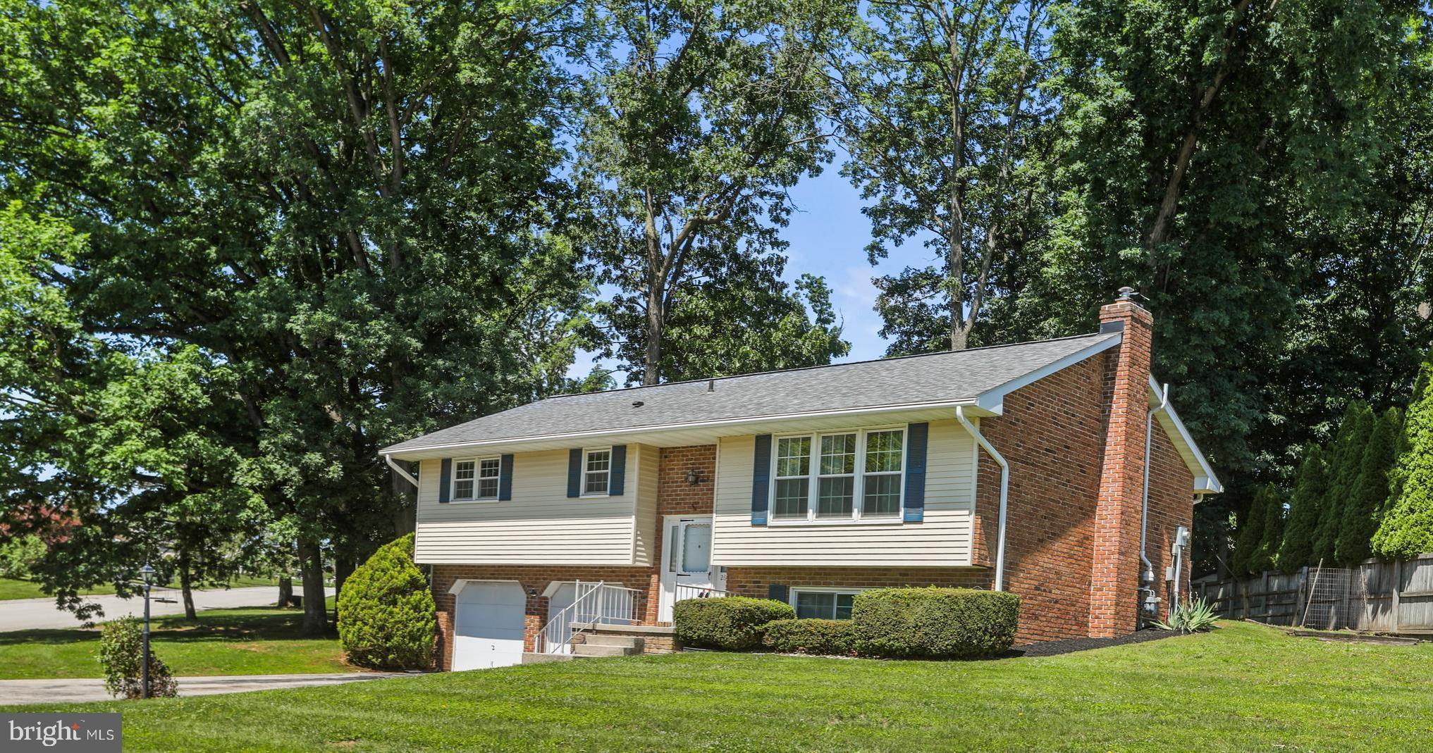 This charming 3-bedroom, 1½ bath home with 2 car garage is located on 1/3 acre with mature shade trees located in South Western School District, close to schools, shopping, restaurants, Codorus State Park and within commuting distance to Maryland. The main level has birch raised panel kitchen cabinets along with a double stainless sink with a view into the rear yard. There is access to a 12’ x 21’ covered porch and flagstone tile patio area from the kitchen. The lower level has a 24’ x 24’ finished family room with access to the laundry room containing a ½ bath combination. The home is heated by a Burnham natural gas hot water baseboard heating system with 2 zones. The windows are Anderson thermal pane. Leaf Guard was installed in 2012 and the current architectural shingle roof was installed in 2020. The attached garage includes one automatic door opener and exterior keypad. The driveway has parking space for four cars. Inside the garage is a hose bib and drain. The Lennox central air unit and handler is approx. 2 years old. Attached to the rear of the house is an 8’ x 8’ garden shed. There is a stain in the family room drop ceiling from a past faucet leak which has been repaired. The basement shower handle needs replacement and the dishwasher is currently disconnected. Personal property included in the sale: refrigerator, oven/range, hood, dishwasher, dryer, washer, blinds and a safe. All appliances are “as is”.