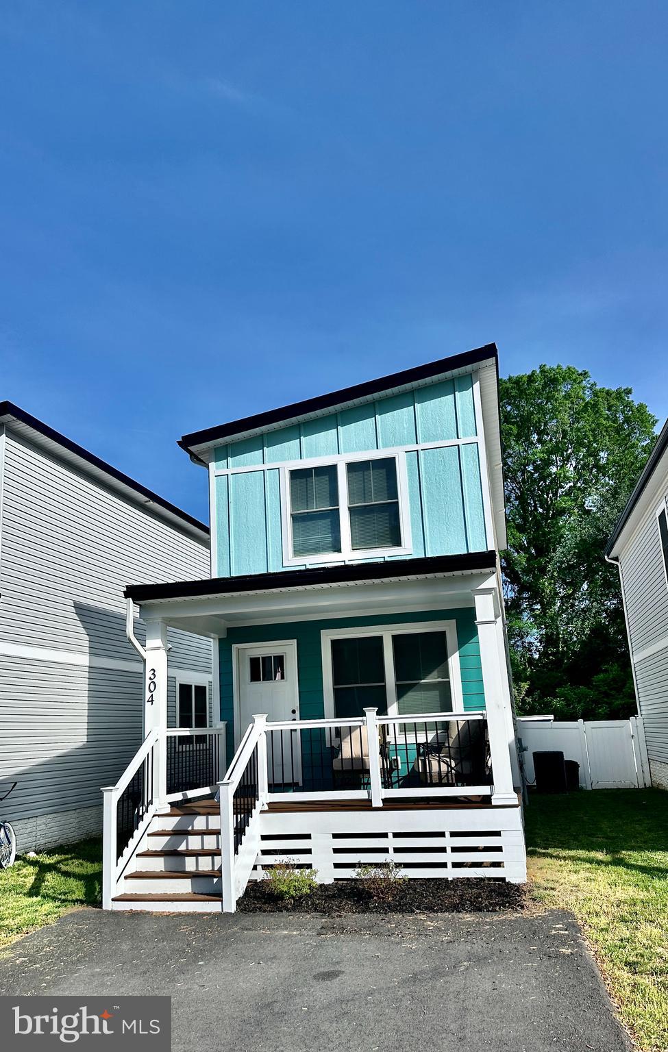 **Charming Coastal Retreat in Pastel Place, Colonial Beach, VA**

Welcome to your dream home in the quaint Pastel Place community of Colonial Beach, VA! This unique, one-of-a-kind colorful home at 304 Pastel Place offers a vibrant exterior in soothing teal hues, perfectly blending modern charm with coastal vibes. Nestled among four other distinct homes, this small enclave is a hidden gem.

Step onto the spacious front porch, ideal for sipping morning coffee or watching the sunset. Inside, discover two generous master suites, each designed for comfort and privacy—perfect for families, guests, or multi-generational living. The open layout maximizes space and light, with large windows framing views of the lush surroundings.

Enjoy the low-maintenance yard, complete with a paved driveway, a fully fenced backyard for added privacy, and a maintenance-free exterior. Whether you're seeking a full-time residence or a weekend getaway, this home offers the best of Colonial Beach living—close to the Potomac River, local dining, and charming shops.

Don’t miss your chance to own a piece of Pastel Place’s unique charm! Schedule your tour today.