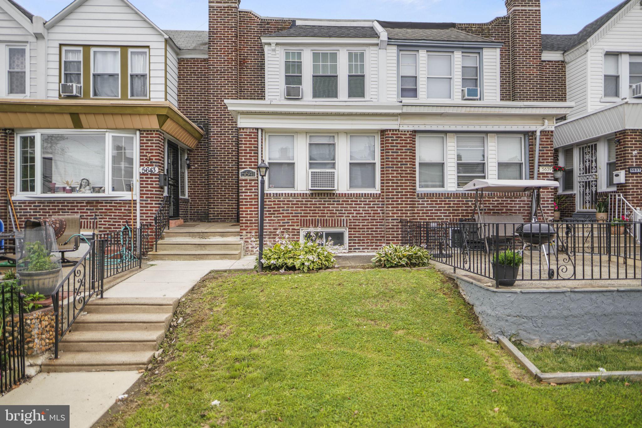 Welcome to this well-maintained, move-in-ready townhome located on a quiet, tree-lined block in desirable Oxford Circle. Combining classic charm with thoughtful updates, this home offers comfortable living space both inside and out.
Step through the spacious entry into a bright and inviting living room that flows seamlessly into the formal dining room, all featuring gleaming original hardwood floors. The updated eat-in kitchen is equipped with granite countertops, stainless steel appliances, and ample cabinet space, making it perfect for everyday living and entertaining.
Upstairs, you'll find three generously sized bedrooms and a charming vintage hall bath that adds character and warmth to the home.
The finished basement provides valuable additional living space and features classic real wood paneling, laminate flooring, a front-loading washer and dryer, and direct access to the attached one-car garage. Rear alley access offers additional parking space.
Enjoy relaxing outdoors on the fenced front patio with attractive pavers, ideal for morning coffee, barbecue, gardening, or gathering with friends and neighbors. 
Located on a well-maintained block with mature shade trees and parking on both sides of the street, this home offers easy access to shopping, dining, schools, public transportation, and major commuter routes.
A wonderful opportunity to own a lovingly cared-for home in one of Northeast Philadelphia's most established neighborhoods. The refrigerator, washer, and dryer are included with the sale and Verizon FIOS is already installed in the house; with little to do but unpack, this home is truly move in ready. Schedule your showing today.