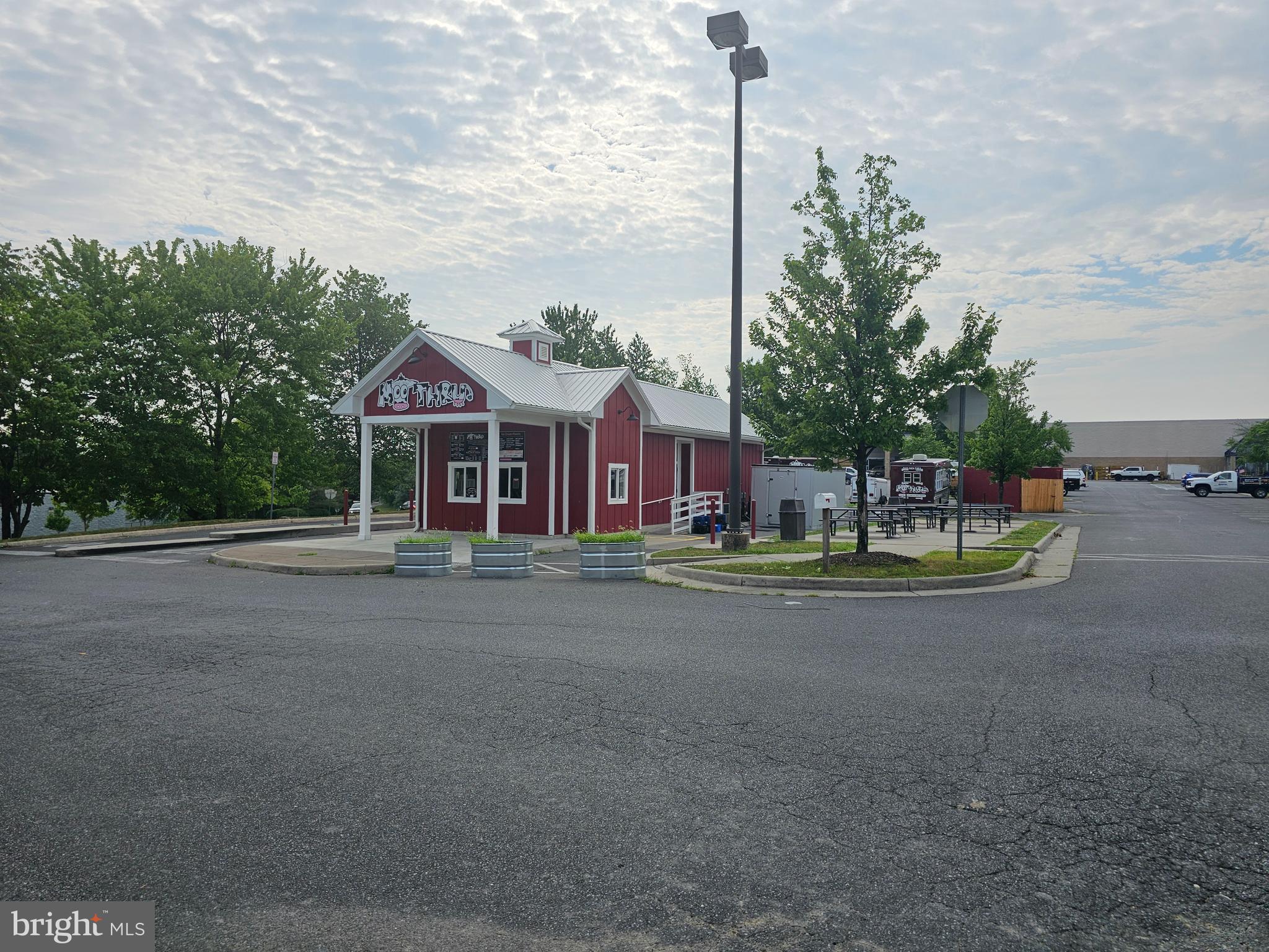 Position your business in the heart of Winchester's premier retail corridor. This highly visible commercial outparcel offers an outstanding opportunity for retail, restaurant, medical, financial, or service-oriented development in one of the region's strongest shopping destinations.
Located just off South Pleasant Valley Road with immediate access to Interstate 81, the property is surrounded by major national retailers including Lowe's, Walmart, Kohl's, Home Depot, Apple Blossom Mall, and numerous restaurants, hotels, and service businesses, creating exceptional consumer traffic throughout the day. The property sits within Winchester's primary retail trade area, drawing customers from the Shenandoah Valley, Northern Virginia, West Virginia, and Maryland. Current operating drive-thru. 

Property Highlights
Prime 0.57-acre commercial outparcel
Zoned CM-1 allowing a wide variety of commercial uses.
Utilities available with water and sewer connections.
Excellent access from Patsy Cline Boulevard and South Pleasant Valley Road.
Minutes from I-81 interchange.
Surrounded by established national retailers and restaurants.
Strong daytime employment and regional consumer base.
Ideal for:
Quick-service or fast-casual restaurant
Coffee shop
Medical or dental office
Financial institution
Retail showroom
Professional office
Convenience retail
Specialty retail

Whether you're developing a flagship retail location, constructing a freestanding commercial building, or creating a custom build-to-suit opportunity, this site offers the visibility, accessibility, and surrounding retail synergy needed for long-term success.