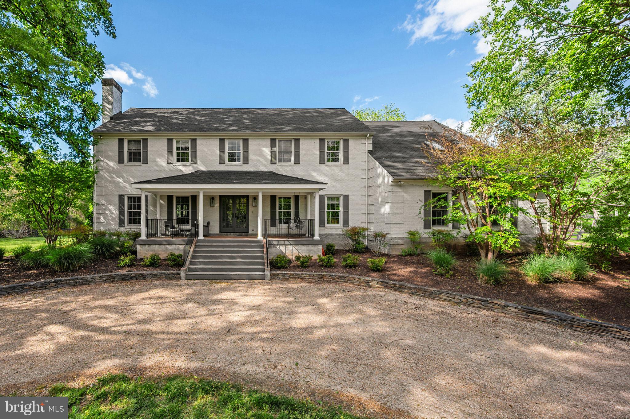 Set on a private 3.3-acre parcel in the heart of Great Falls, this beautifully renovated colonial home  offers an exceptional combination of luxury, privacy, and resort-style living within the sought-after Langley High School pyramid.
Thoughtfully reimagined with high-end finishes and modern upgrades throughout, the home features a stunning gourmet kitchen, renovated baths, elegant living spaces, and seamless indoor-outdoor flow designed for both everyday living and entertaining. Featured in Home & Design magazine, the residence blends timeless architecture with sophisticated contemporary updates.
Outside, the property unfolds as a private retreat with expansive outdoor living areas, lush landscaping, a multi-level deck, and a spectacular saltwater pool with integrated spa. The peaceful setting provides the rare opportunity to enjoy estate living while remaining just minutes from major commuter routes, Tysons, Reston, and Washington, DC.
The upper level offers spacious bedrooms, including a luxurious primary suite with a spa-inspired bath and custom walk-in closet. The walk-out lower level provides additional recreation and entertaining space with direct access to the pool and grounds.
A rare offering in one of Northern Virginia's most prestigious communities, this exceptional property delivers the lifestyle, privacy, and flexibility that Great Falls buyers seek.