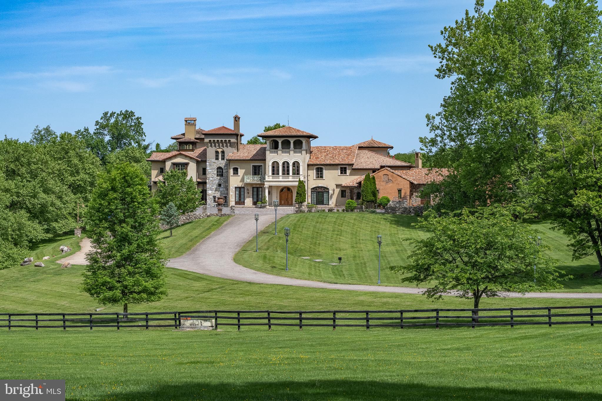 MILLION DOLLAR PRICE REDUCTION! QUALIFIED BUYERS WELCOME! "Fine Homes & Lifestyles" cover feature! Architecturally distinguished property. Custom built estate, luxury of modern-day amenities combined with imported, antique, historic, thoughtfully resourced building materials & detail bring centuries old world charm to this extraordinary 10-acre Potomac Tuscany inspired Villa. Minutes to Washington DC. 8 to 12 ensuite bedrooms, libraries, offices, spacious gathering & lecture areas. Land your helicopter-security & privacy; entertain large gatherings-wedding venues, stone chapel replica of ancient Italian estate w/ Della Robbia inspired bell; entertain fine arts displays or performances; host concert pianist recitals; house guests who travel from abroad to attend your venue - closest to downtown Washington DC, convenient location to northern Virginia and Baltimore; minutes to golf courses hosting major tournaments; Airbnb or bed & breakfast hosts' dream property, great place for a spa, relaxing Turkish baths; NIH, medical institution or University satellite location for gatherings to further education, enrichment, group meetings & presentations, international conferences; embassy or consulate ownership, consular offices, ambassadorial residences, government embassy, serene, gated, security & privacy convenient location close proximity to DC; high-level relocation for foreign service officers; relocation consultants, international organizations & consulates; tranquil, inspiring haven to host retreats or ceremonial gatherings; bring your horses; fish-carp filled pond; grow grapes, vineyard potential; artist's inspirational getaway w/studio to display creations; serenity ,writer's escape from hustle & bustle of city ; swim laps year round "against the current" indoor pool (specially designed HVAC system to reduce humidity) enjoy a game of pool volleyball w/ friends; cook in the true gourmet kitchen boasting a spectacular Lacanche stove imported from France; gracious home family, friends & guests can enjoy.  Grand property, designed & built w/integrity & genuine craftmanship. Resources, research, history, the study of light and more combined to recreate the appearance of centuries old, Medieval, European influenced architecture and culture & modern comforts for prestigious living, welcome to "Albero del Segnale" Driveway built of centuries old, repurposed cobblestones, came to this country from Europe as ballasts on sailing ships and were then used to pave city streets. Pass through the iron gates, the double stone entrance pillars capped with custom made lanterns from Italy and along the driveway lined with antique streetlamps. Greeted by the front landing made of hand-hewn antique limestone pavers from Italy and twin Corinthian limestone columns also custom made in Italy. Front doors, supported by gold-plated, hand-chiseled hinges custom made in France, spectacular classic Italian design featuring iron grillwork in the glass transoms and a working "man door," door within a door - tradition dates to Medieval times. Grand foyer drenched with natural light from 2+ story windows, welcomed many renown performers and pianists, fantastic acoustics! Every room in this grand, glorious mansion is abundant with natural light, every angle of each room has magnificent windows connecting pastural rolling views with interior. Centuries-old hand-molded antique terra cotta floors w/imprints of the artisan's fingers & hands as well as occasional animal footprints are forever defined - imprinted before the tiles dried and were fired. Solid iron balusters & railings designed for this home &hand forged in Italy & so much more! No HOA offers many potential uses