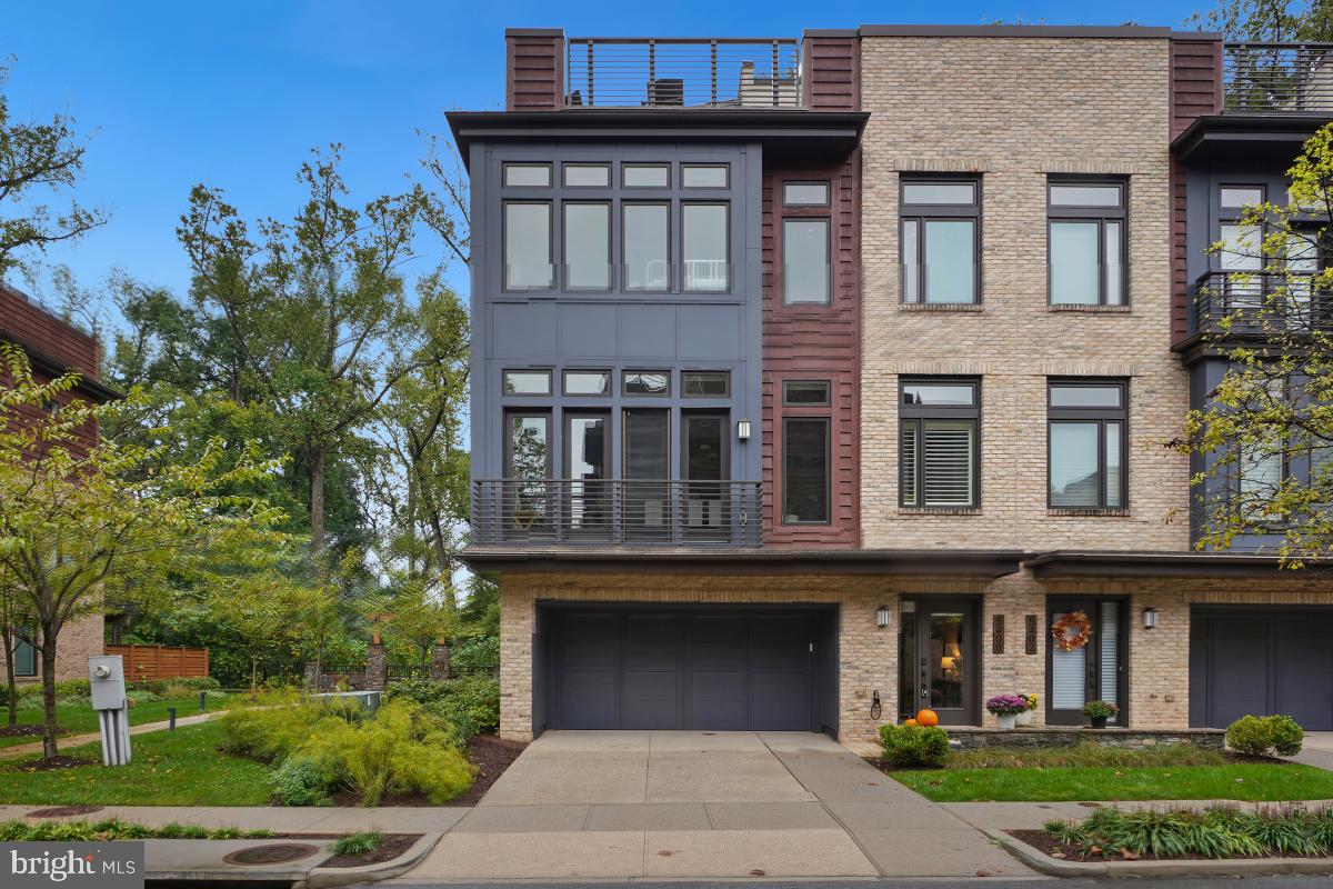 Welcome to Grosvenor Heights, a distinctive EYA townhome that offer an unparalleled lifestyle in a serene, park-like setting. Presenting The Harrison, one of the largest models in this  sought after neighborhood, backing to lush trees in the Spring and Summer months. This beautiful end unit, adjacent to a charming pocket park, boasts fantastic northern, eastern, and southern exposures.

From a private elevator to a grand rooftop terrace, every detail has been thoughtfully considered. This spacious floorplan showcases soaring 10ft main-level ceilings, 9ft bedroom-level ceilings, and dramatic floor-to-ceiling windows. The sleek and modern kitchen features designer cabinetry, framed with quartz countertops and a stylish backsplash, Thermador stainless steel appliances, and a seamlessly integrated refrigerator and dishwasher. When eating at the kitchen island doesn’t suit the vibe, the formal dining room provides the perfect space for dinner parties, and the great room is open for gathering around the modern gas fireplace.

The third level of the home is the designated bedroom level, featuring a fabulous primary suite complete with a walk-in closet and a dreamy ensuite bath displaying a frameless glass walk-in shower, a relaxing soaking tub, and a dual sink vanity. The entry level features a spacious living area that can easily transform into a fourth bedroom with its own private bath. Travel all four floors effortlessly in the private elevator up to the alluring rooftop terrace, providing an outdoor oasis eager for entertaining with a Viking Professional series outdoor kitchen, BBQ gas grill, outdoor gas fireplace, retractable awning, outdoor speakers, and more.

Grosvenor Heights offers the perfect balance of luxury, convenience, and nature, all just minutes from the Grosvenor-Strathmore Metro, and the best shopping, dining, and entertainment in the area.