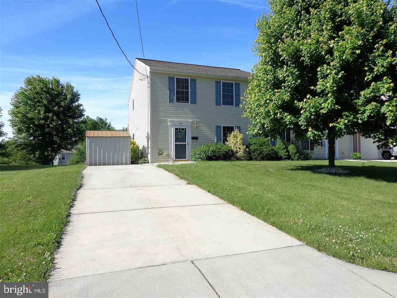 The living is easy in this large 1900 Sq Ft  semi-detached townhome. 3 Bedrooms, 2 & 1/2 Baths. Tastefully decorated , clean and move in ready. Large kitchen with center island, large dining area. Walk-in pantry, Laundry room with half bath, Utility room. Economical gas heat and Central Air .  Walk out to the screened porch and enjoy Summer evenings overlooking the level backyard. Great entertainment space. Large master bedroom with full bath and lots of closets. Two additional bedrooms offer ample closets.